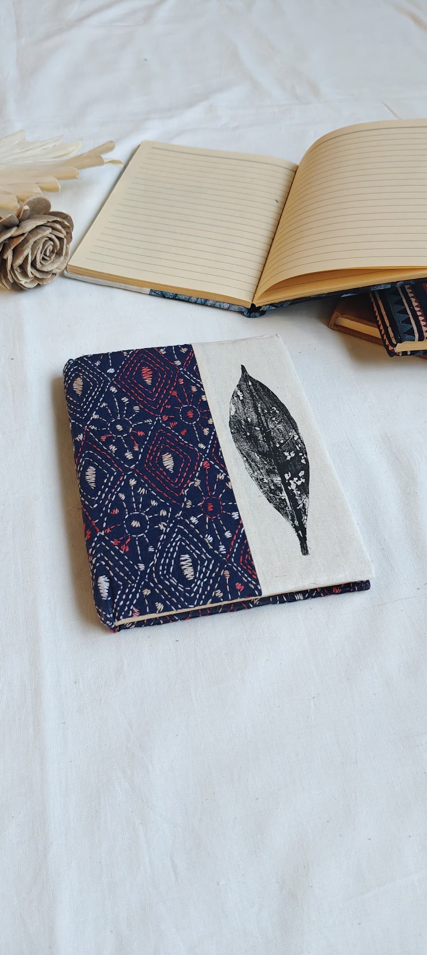 Handmade paper notebooks with hand eco printed fabric cover