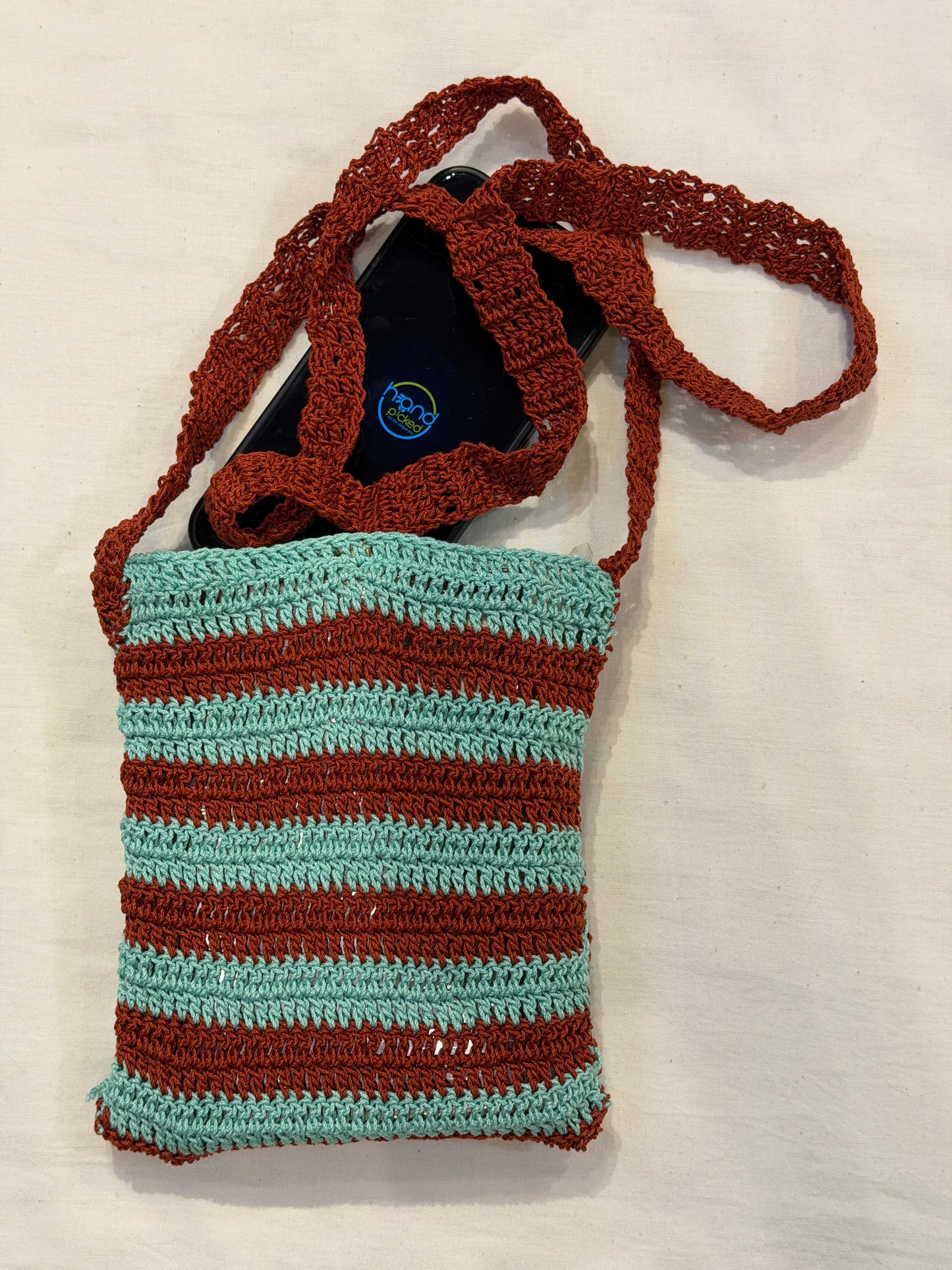 Sling bag for mobile phones - handcrafted crochet bag with click button closure - color options available