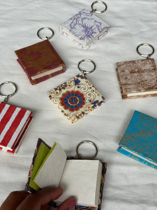 Key ring with small hand made paper notebook