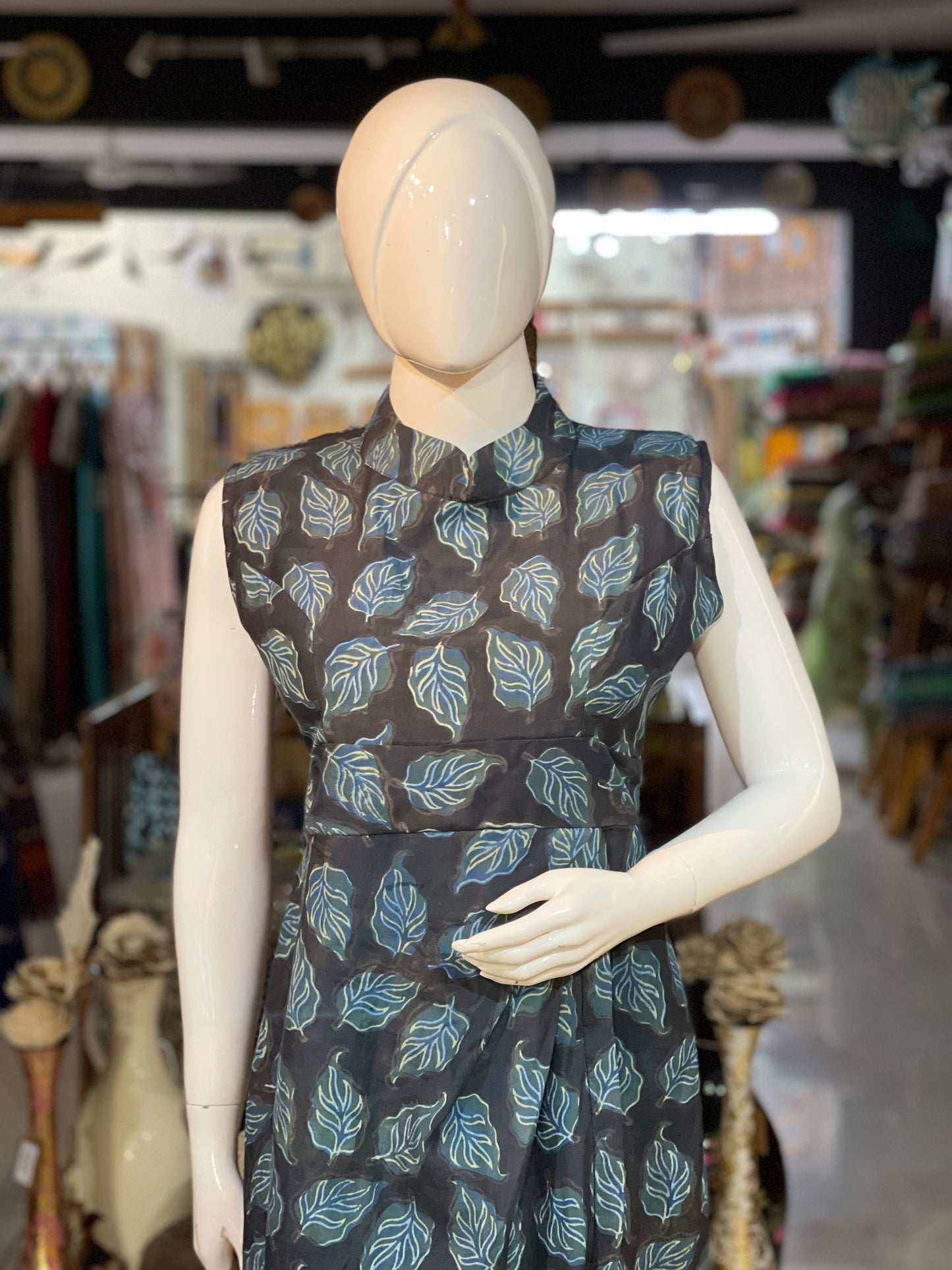 Black hand block printed dress with leaves print and pleats at waist