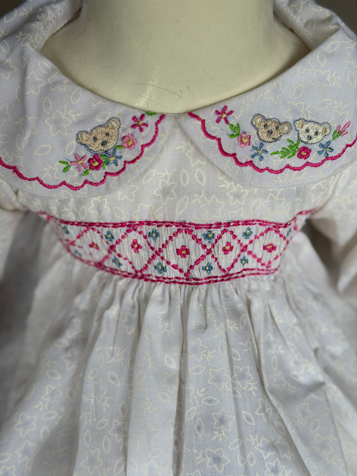 White embroidered cotton frock for girls with embroidered Peter Pan collar and long sleeves