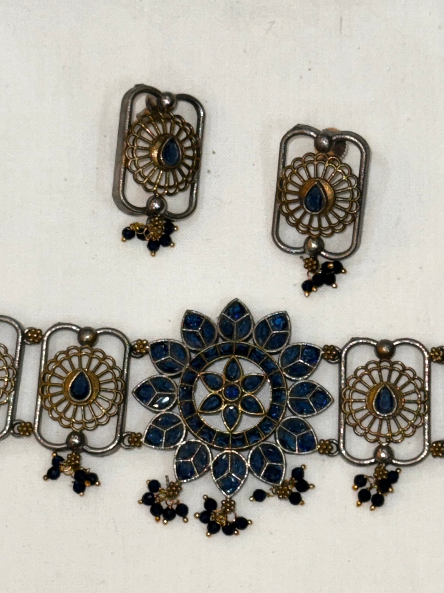 Blue stones choker and earrings set in gold silver dual tone