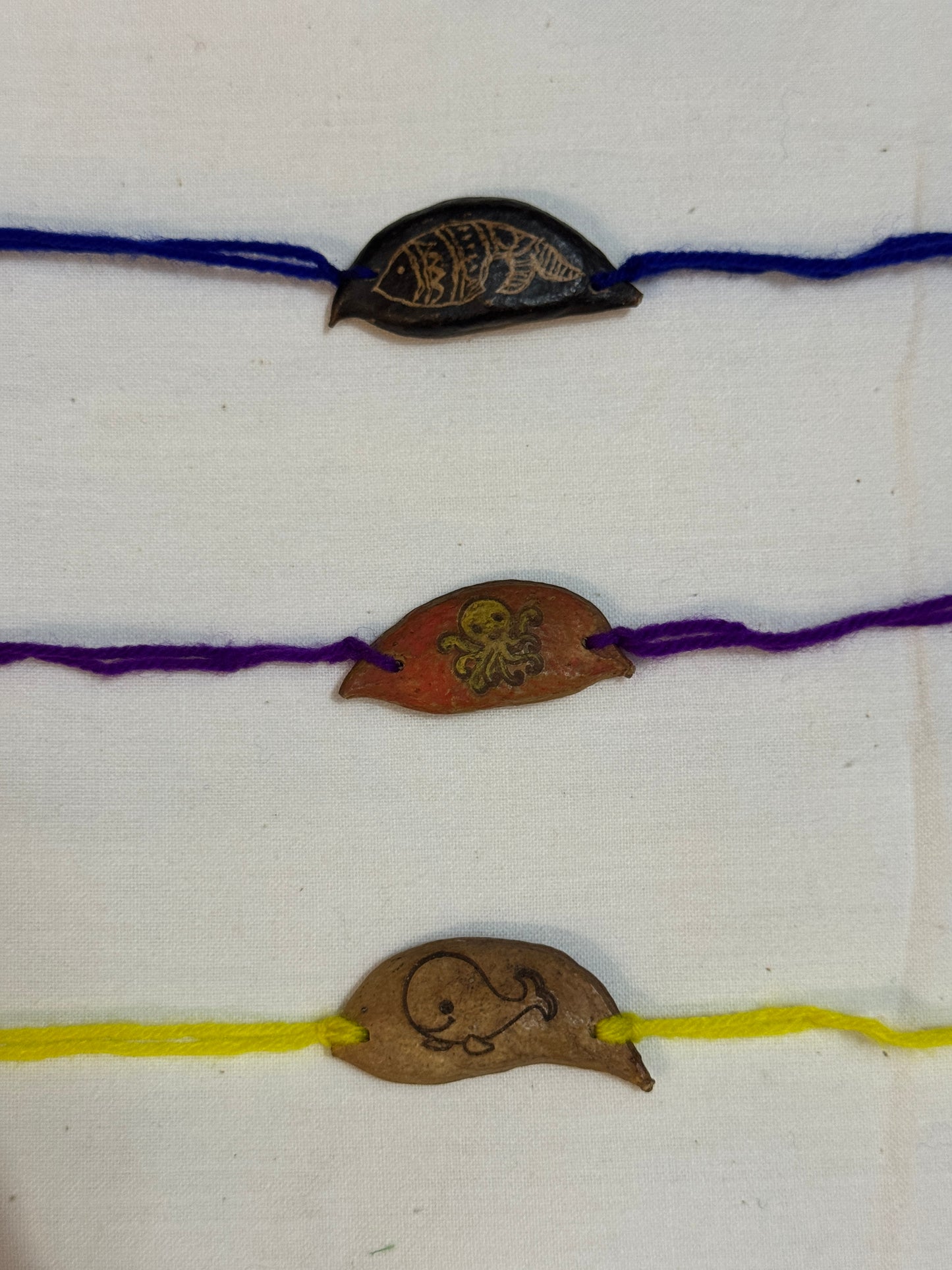 Karanja / Gaanuga / Ponga seed rakhi - hand crafted rakhi with etching / painting details - design options available