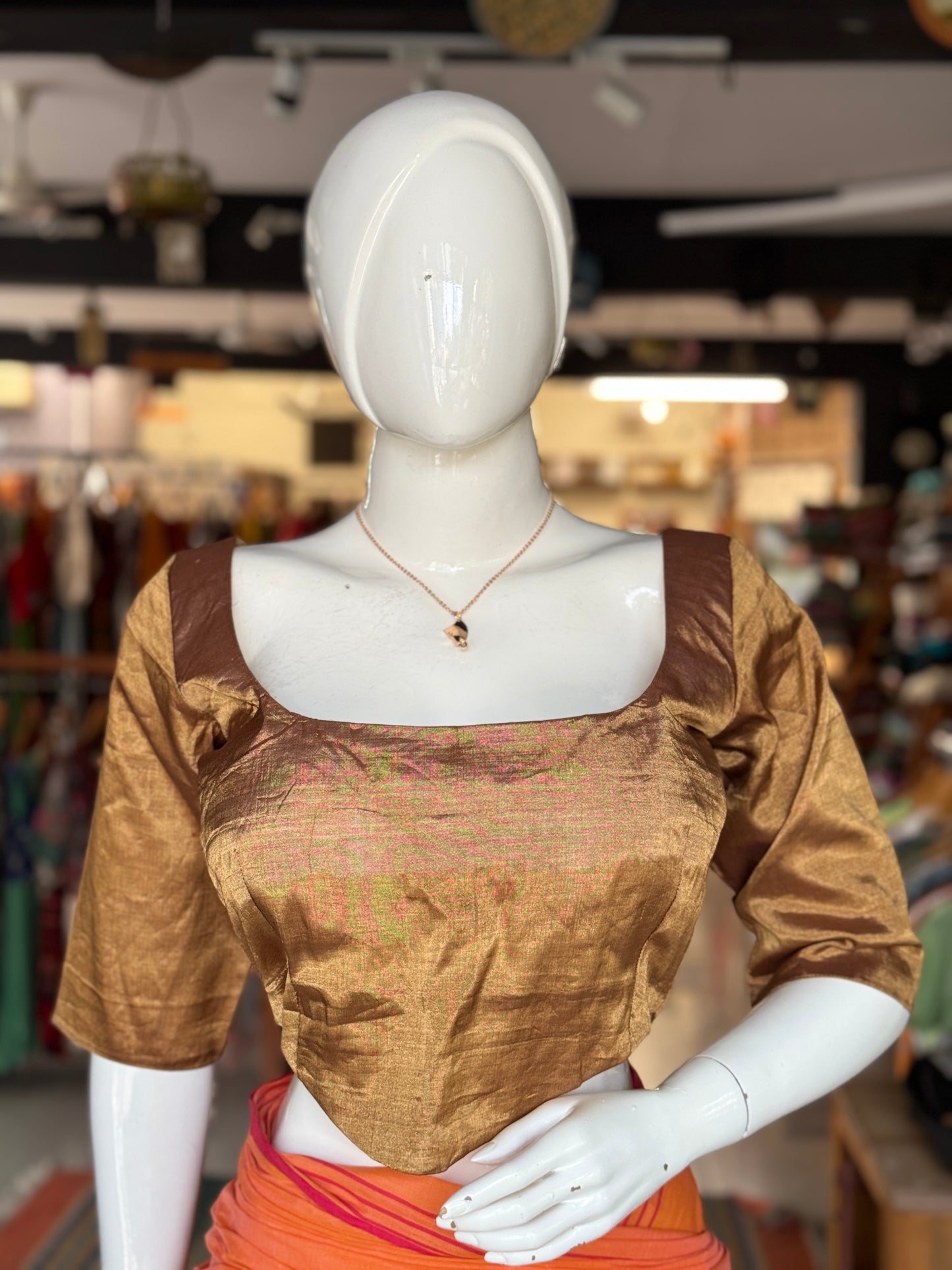 Gold tissue silk Chanderi handloom blouse with wide neck line, waist curve line and sleeves