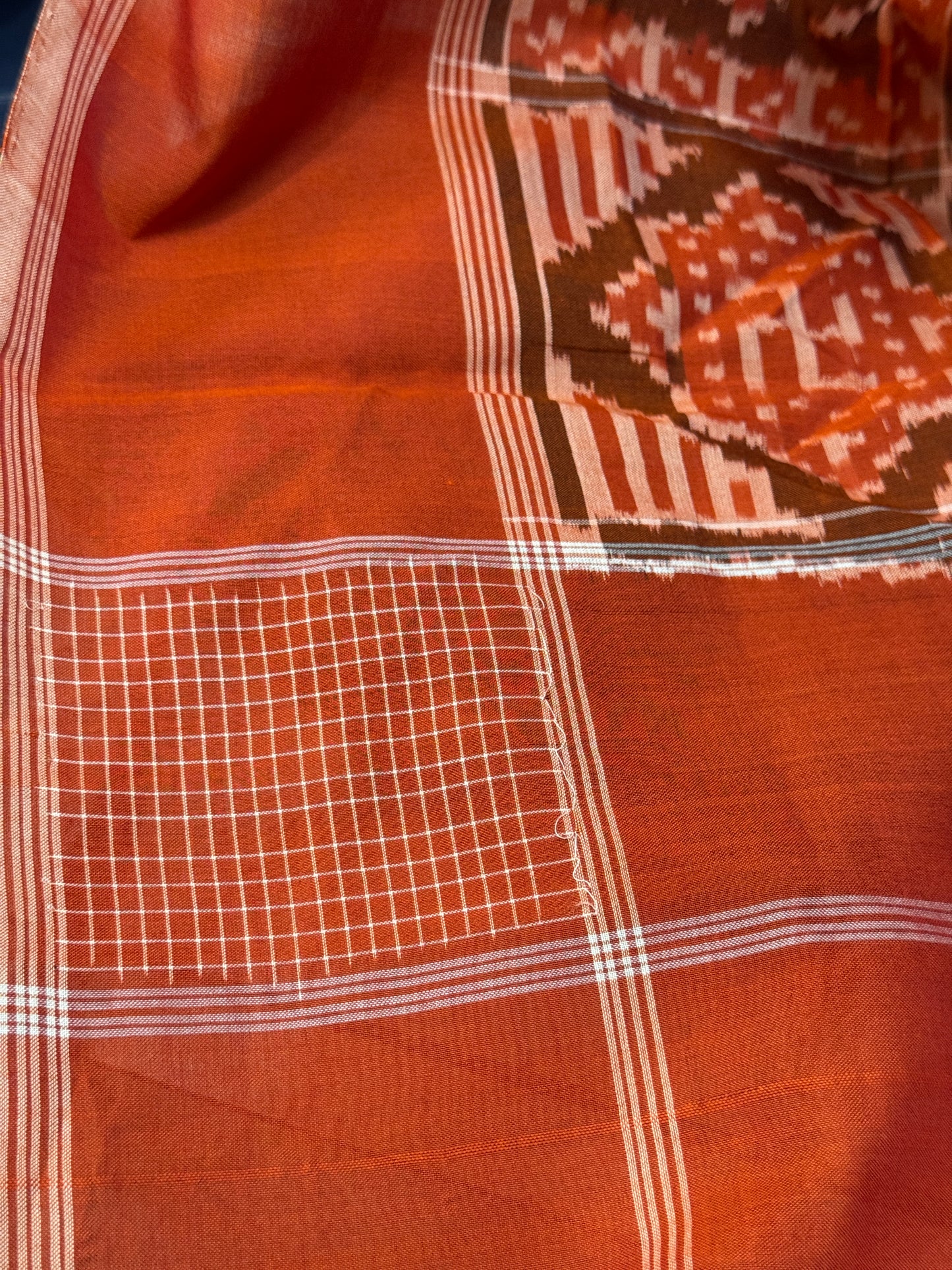 Rust tone cotton handloom soft unisex ikat stole with Swastik motifs