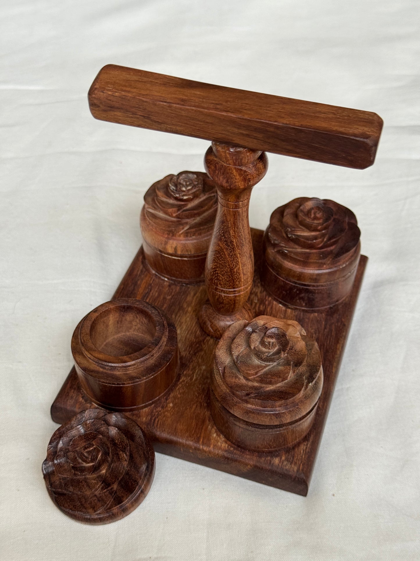 Carry pooja essentials together - handcrafted wood small haldi kumkum chandan akshat boxes with rose on top - with handle and attached to base