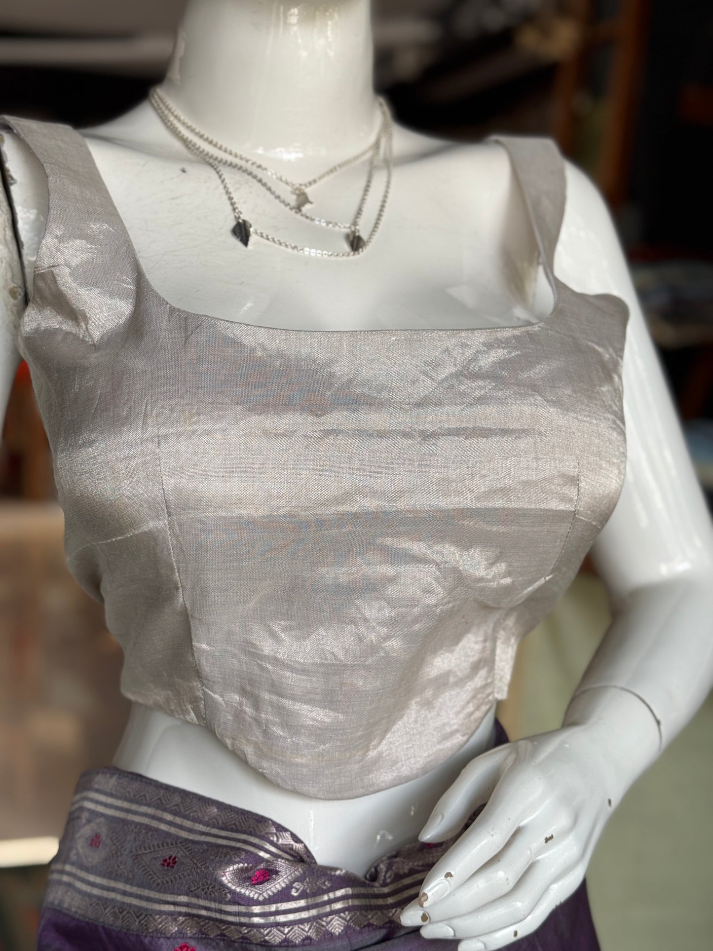 Silver tissue silk Chanderi handloom sleeveless blouse with wide neckline and waist curve
