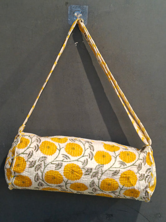 Water proof lined travel and swimming duffle bag in hand block printed, quilted cotton
