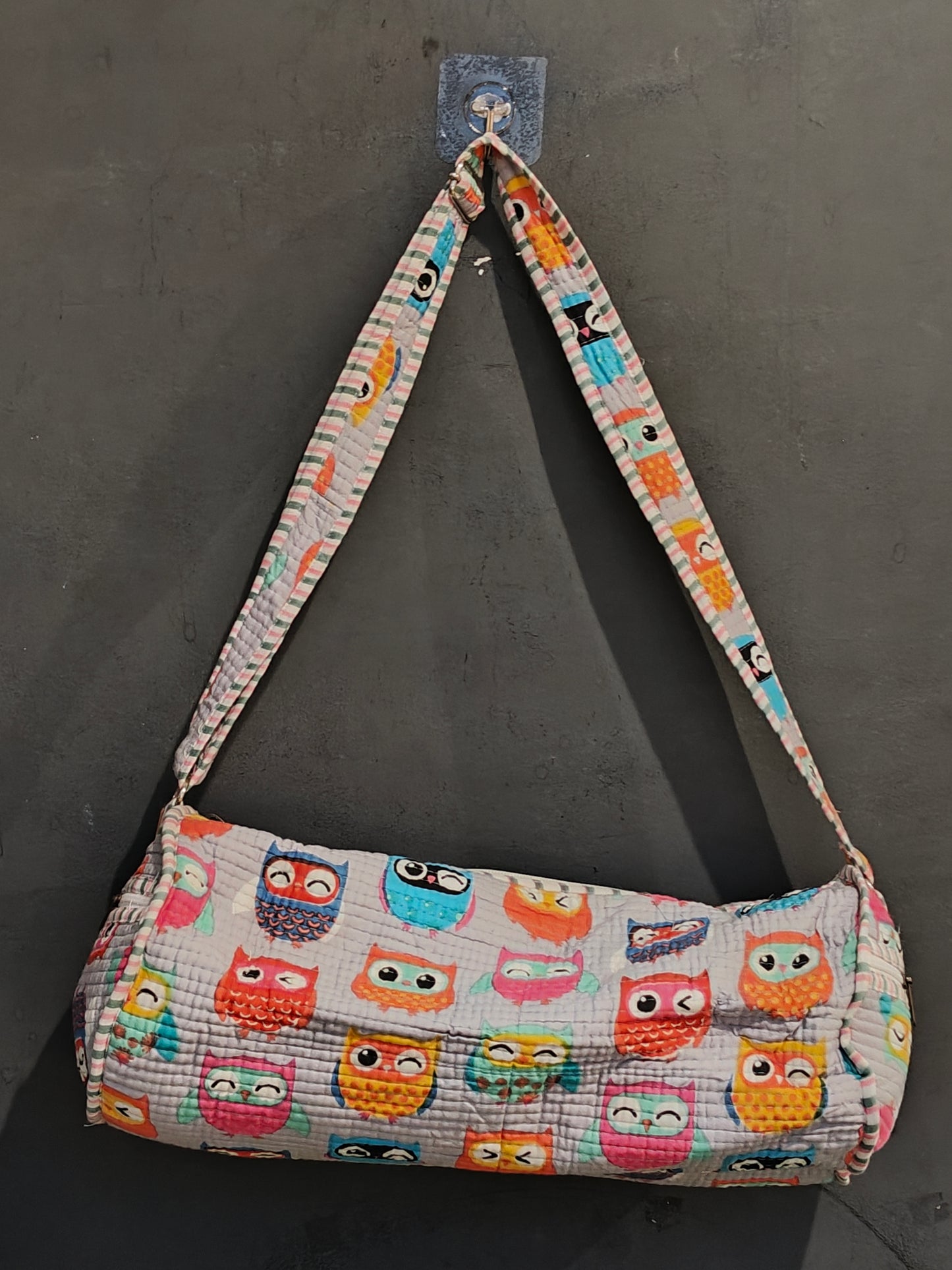 Water proof lined travel and swimming duffle bag in hand block printed, quilted cotton