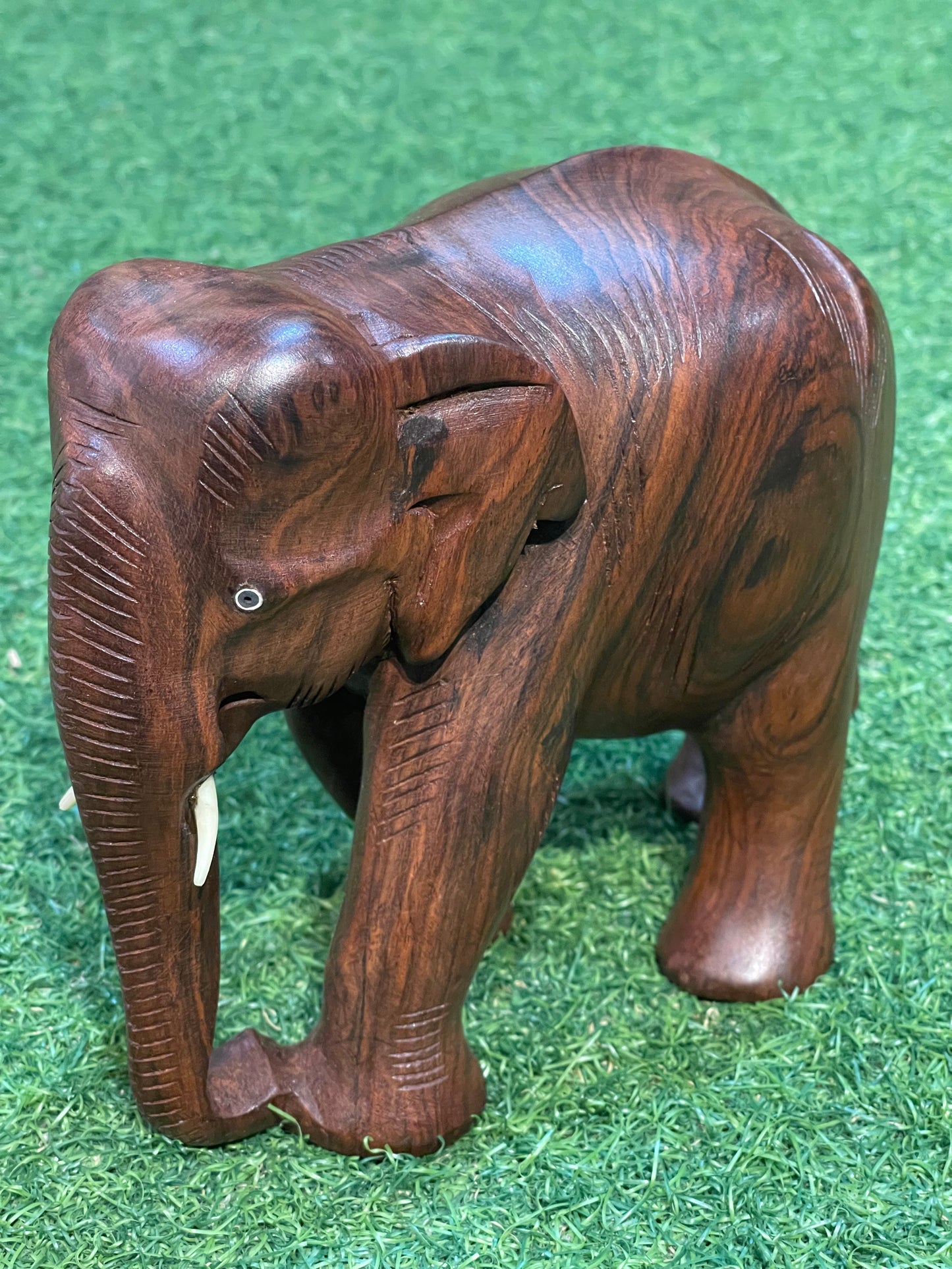 Solid rose wood hand carved wooden elephant decor with beautiful wooden grains patterns