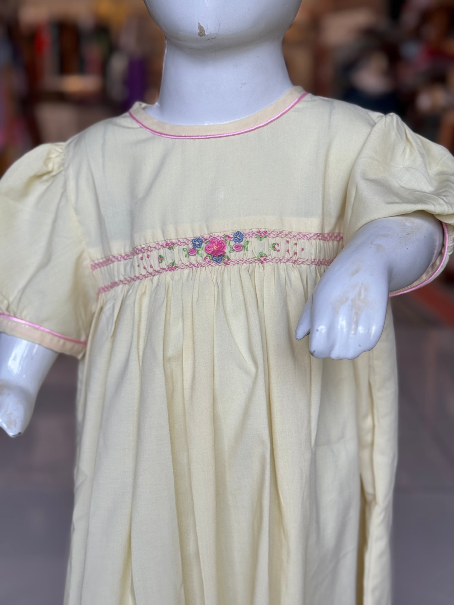 Light yellow hand embroidered smocking frock for girls