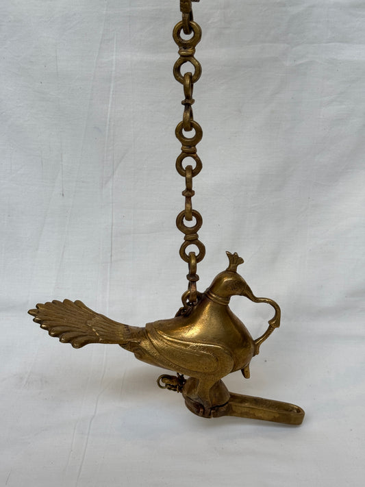 Hanging vintage peacock oil lamp