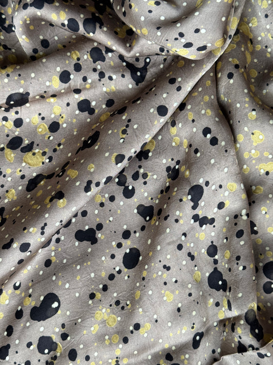 Greyish brown modal Ajrakh hand block print fabric with black and green splashes on it