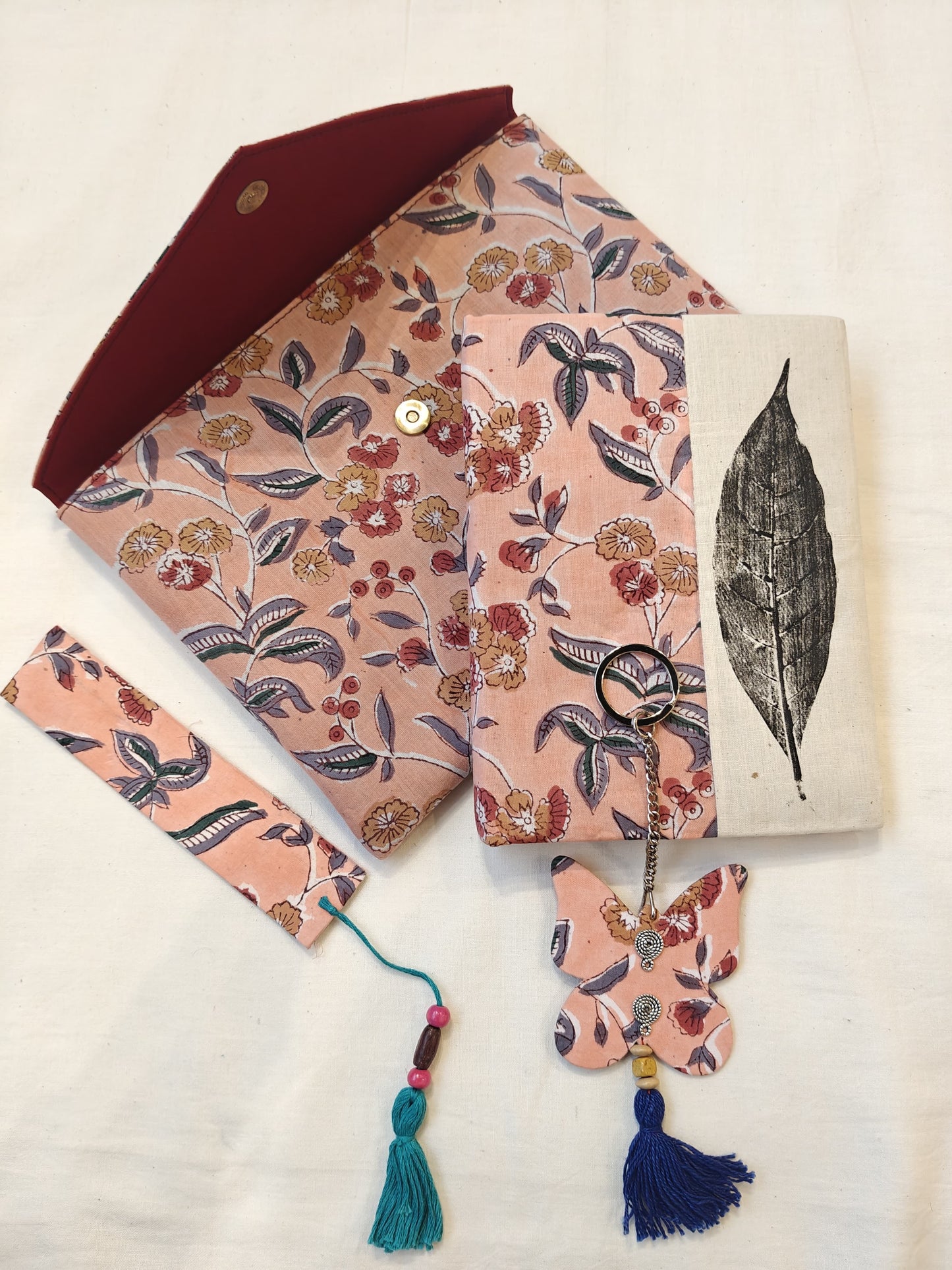 Handmade paper notebook with eco leaf printed fabric cover, hand crafted bookmark, key ring / charm and a container pouch set
