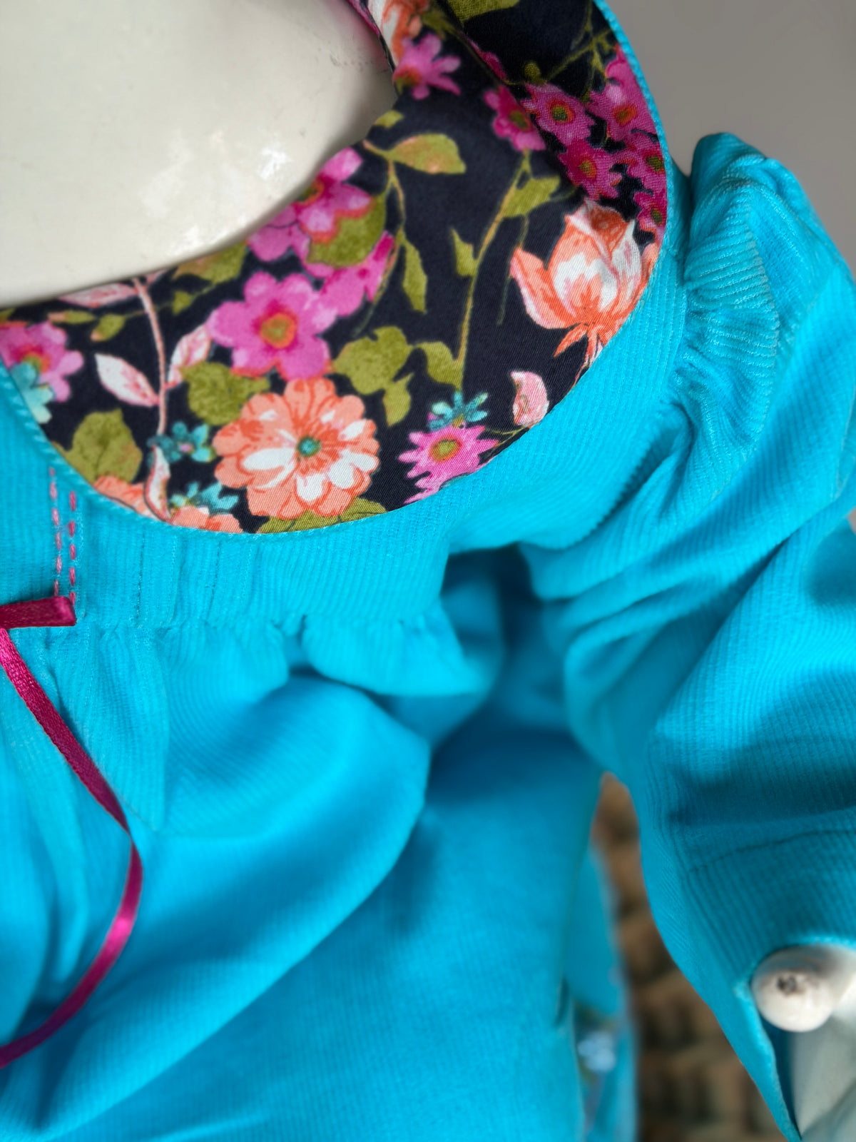 Blue corduroy long sleeves dress with floral contrast Peter Pan collar and hand embroidery