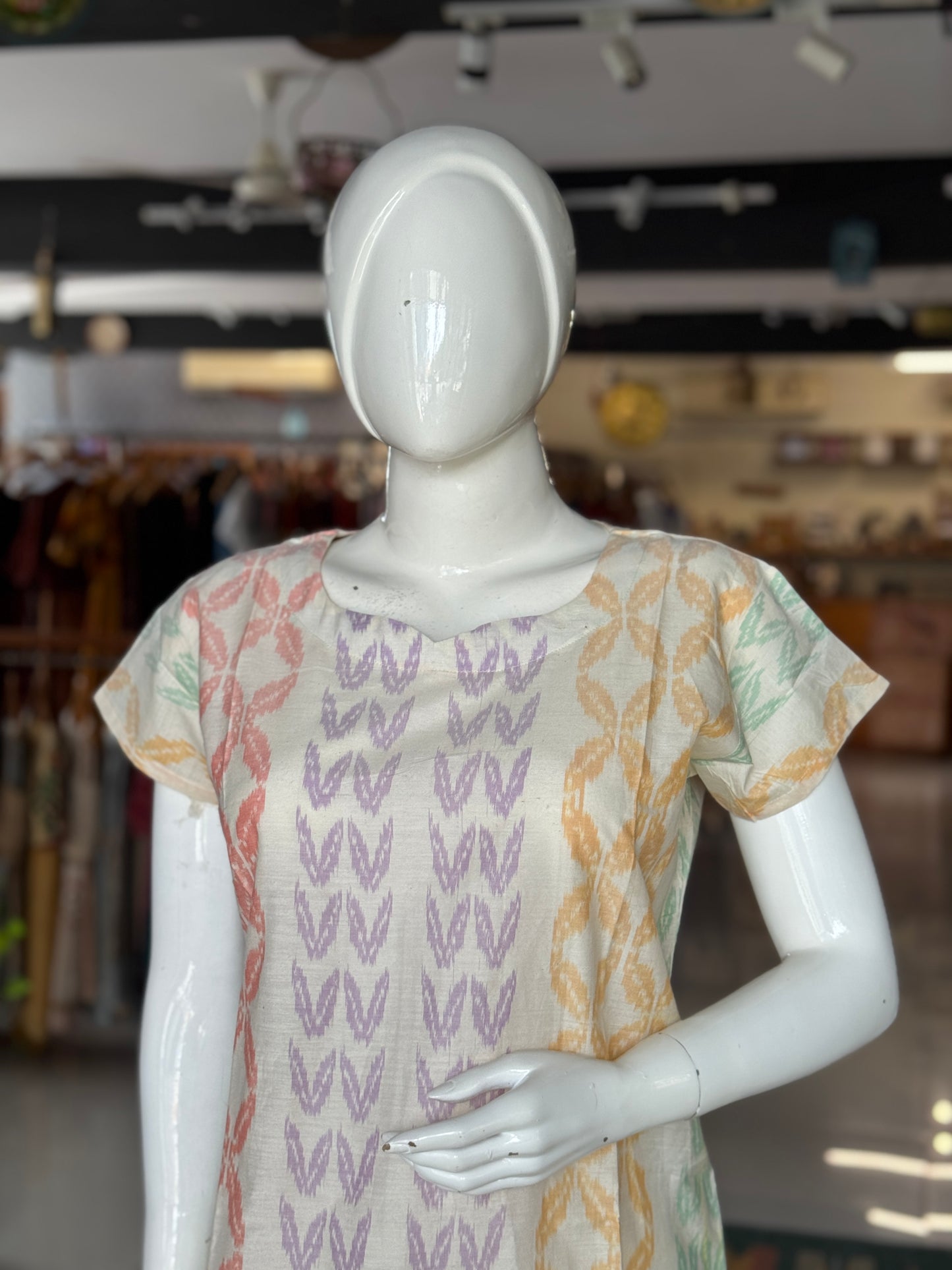 Off white handwoven silk ikat straight kurti with colorful vertical design