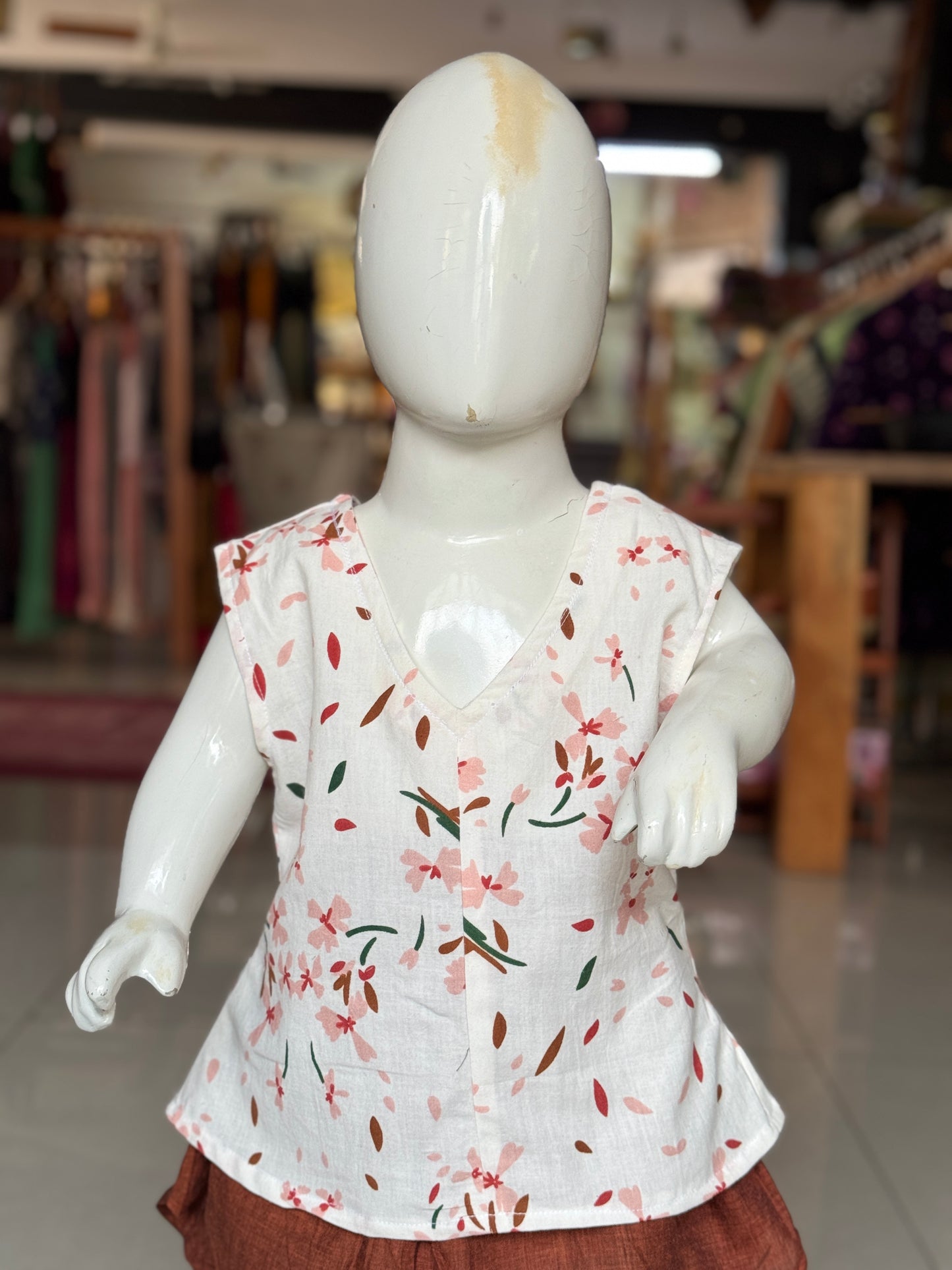 Floral brown print on off white soft cotton handloom top for girls