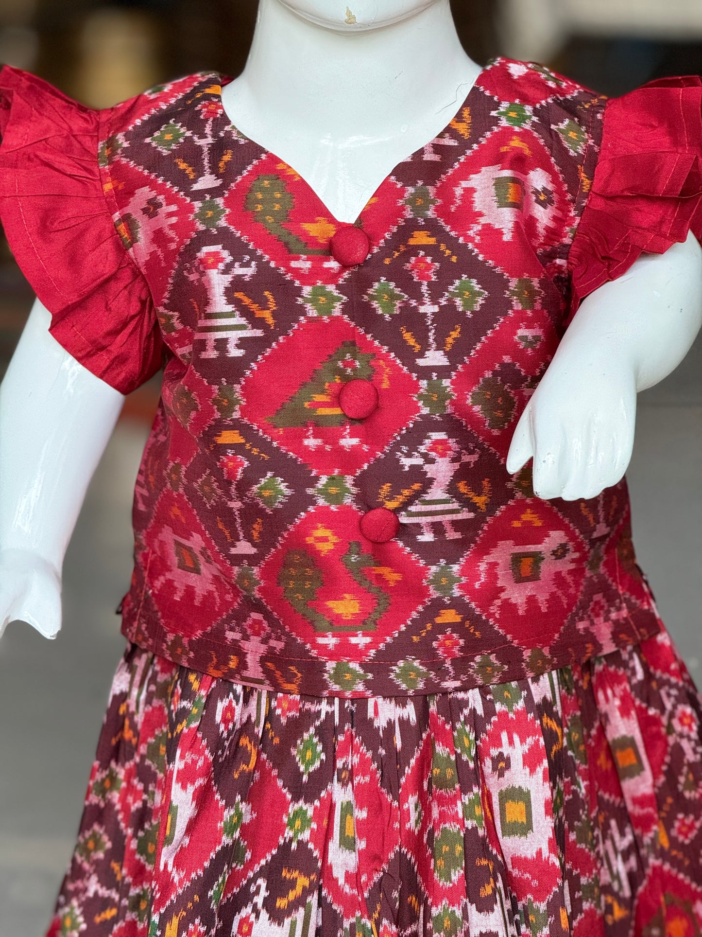 Maroon handwoven ikat pure silk lehenga (pattu langa) with pattu frilled sleeves blouse set
