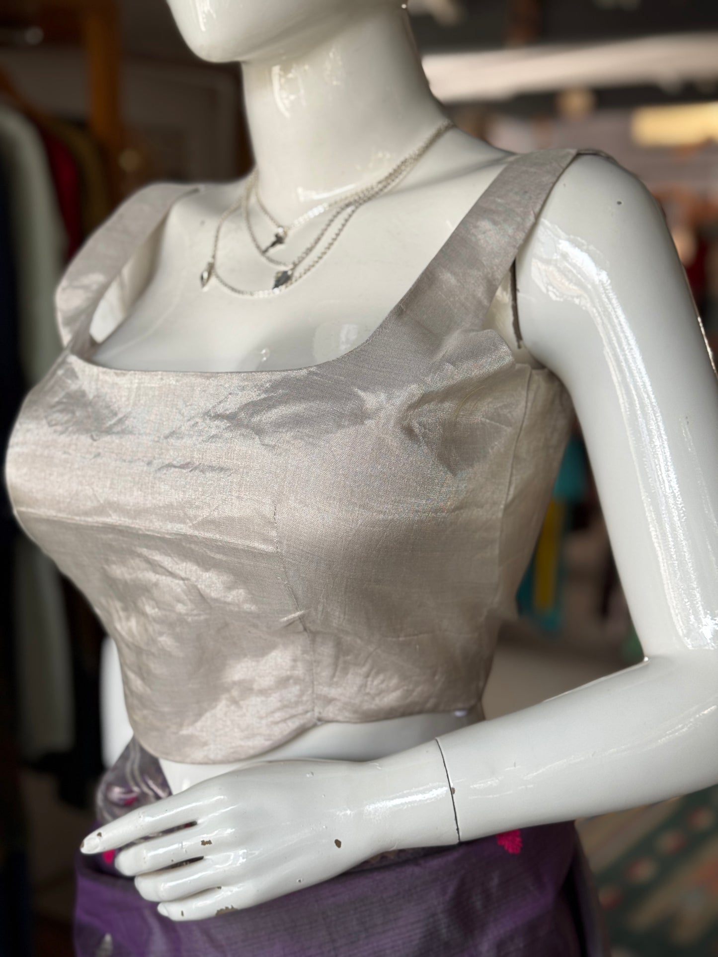 Silver tissue silk Chanderi handloom sleeveless blouse with wide neckline and waist curve