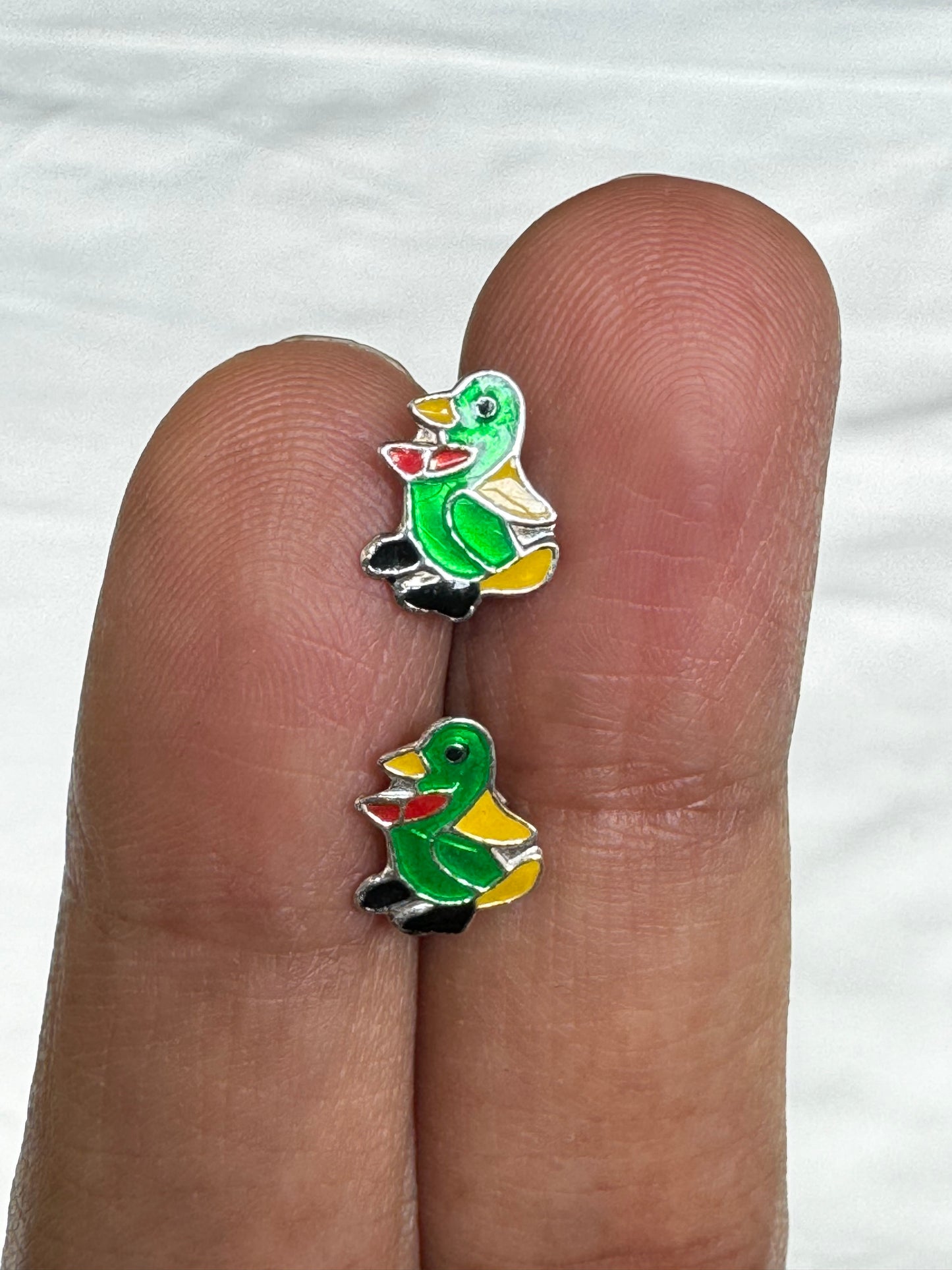 Tiny pure silver studs in cute designs for children