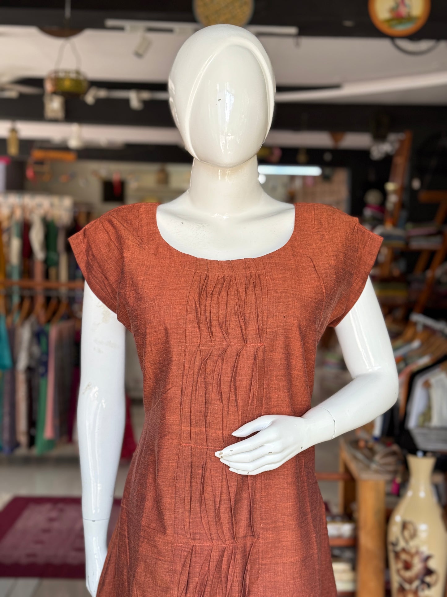 Brown handwoven soft mul cotton dress with twisted pintucks center panel and pleated shoulder sleeves