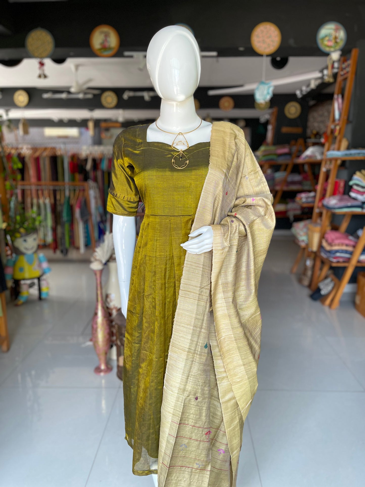 Olive green hand woven tussar x mulberry silk natural dyed dupatta with umbrella motifs