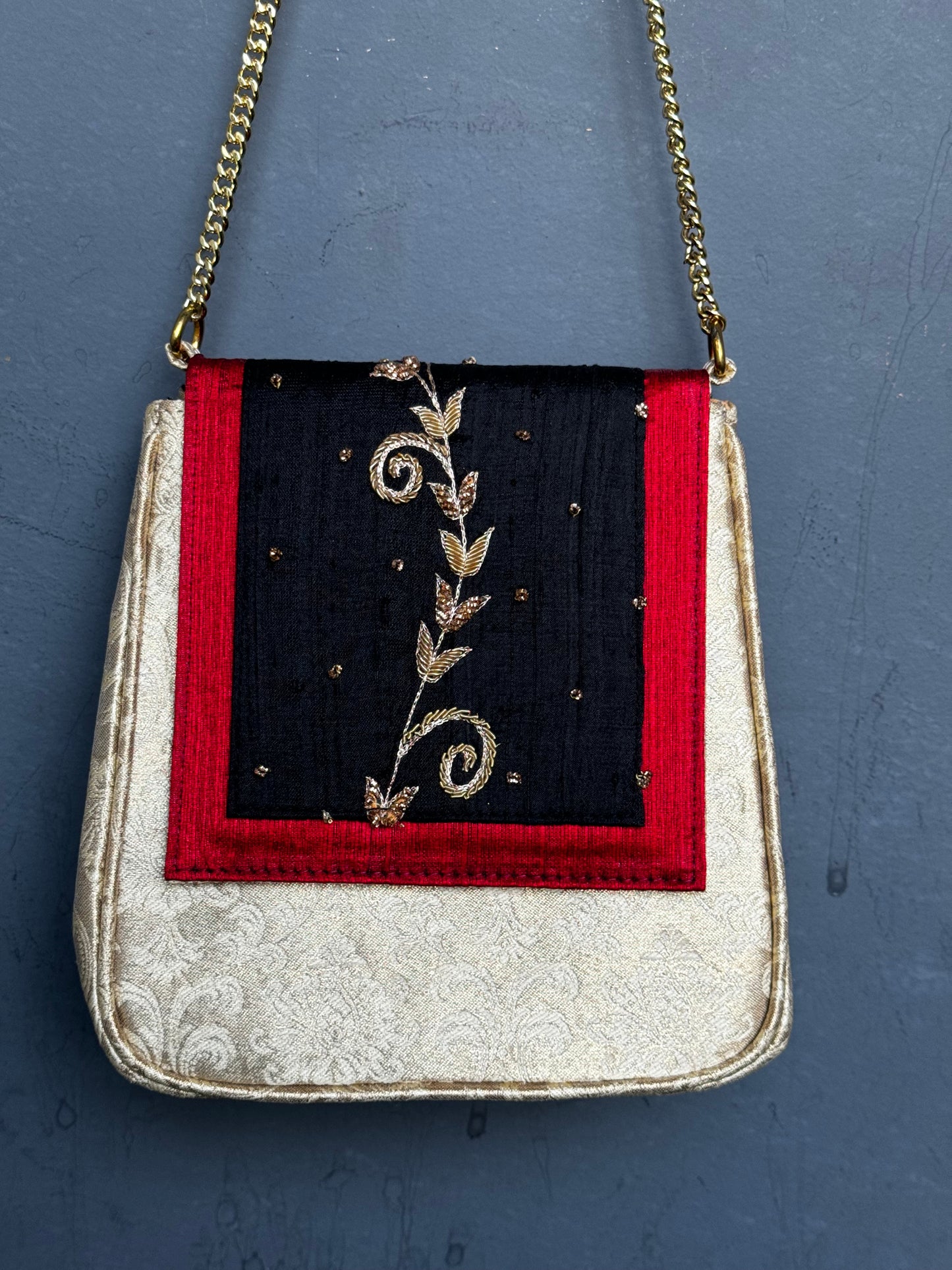 Silk embroidered party bag with chain