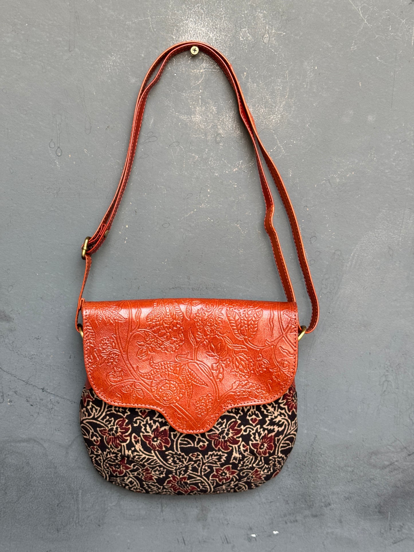 Hand crafted adjustable length sling bag - block printed fabric and embossed leather - multiple designs