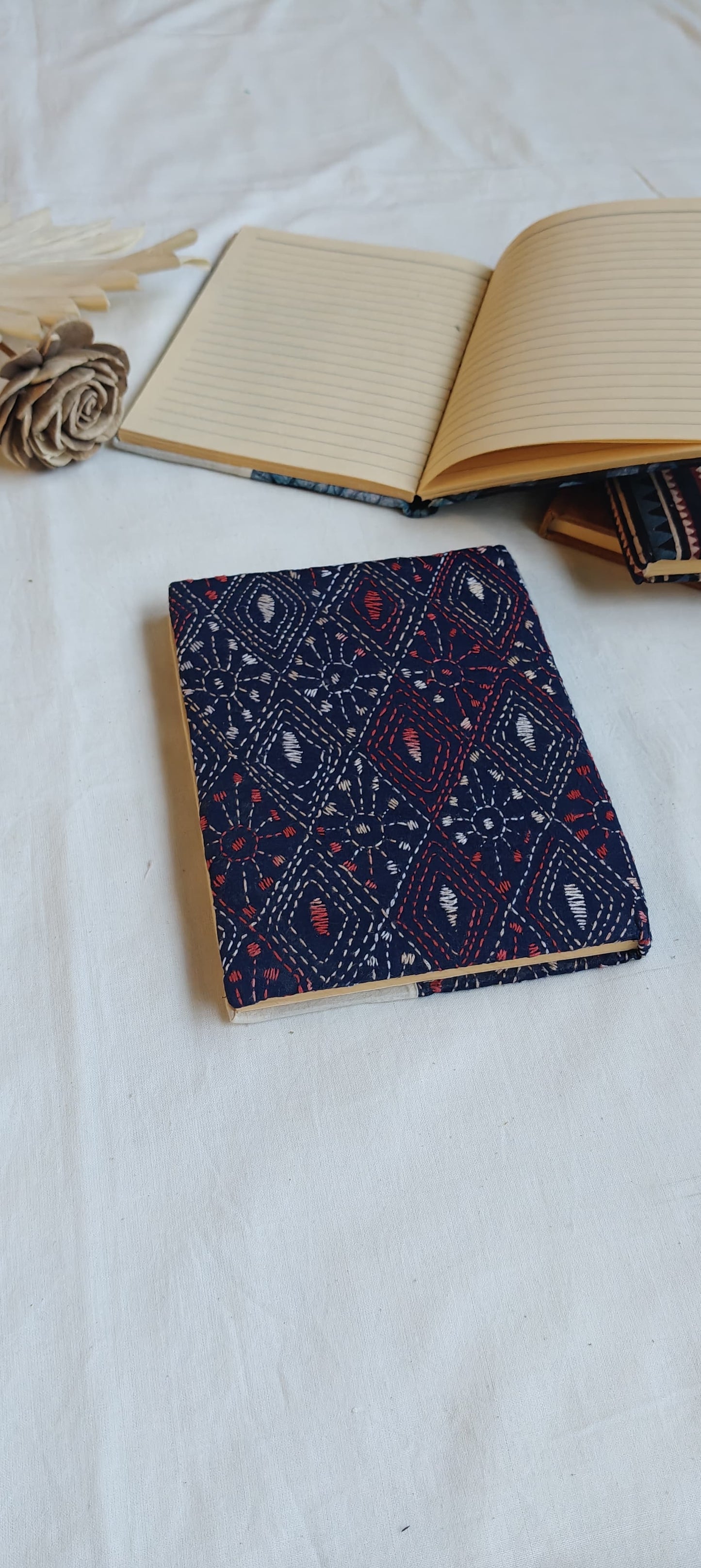 Handmade paper notebooks with hand eco printed fabric cover