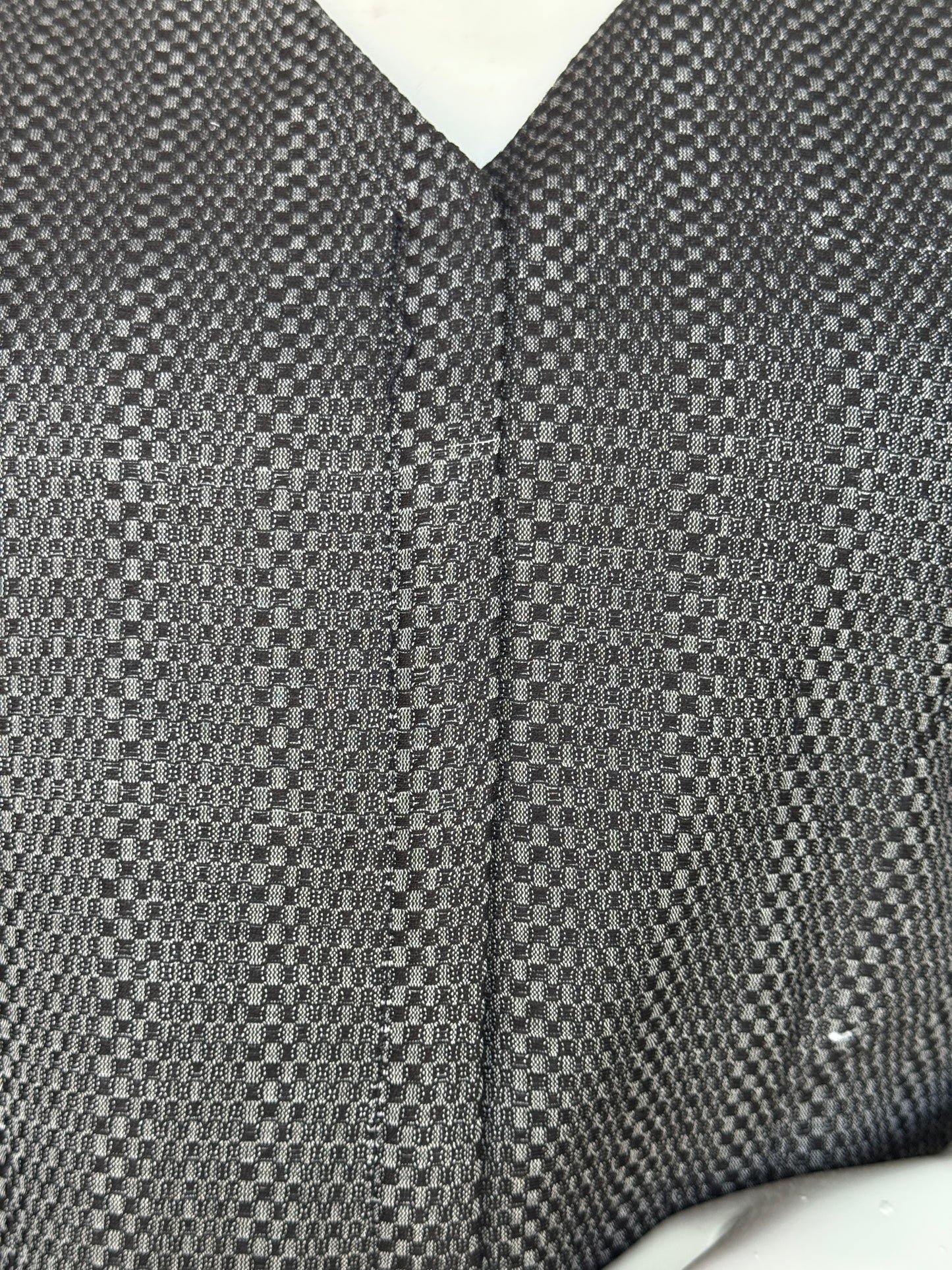 Black textured handwoven cotton top - V neck with curved hemline