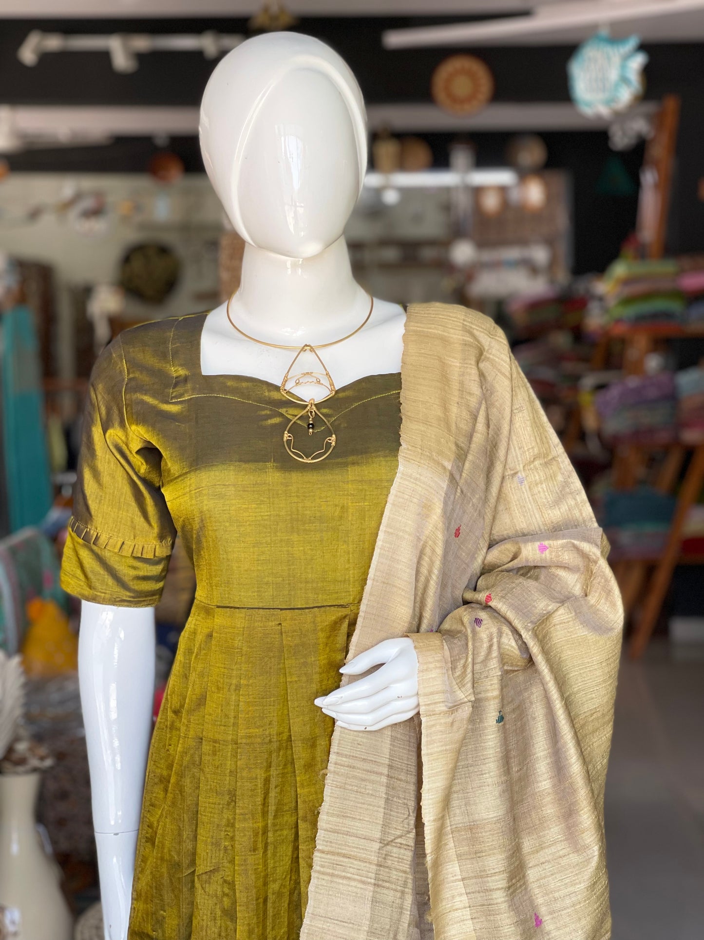 Olive green hand woven tussar x mulberry silk natural dyed dupatta with umbrella motifs