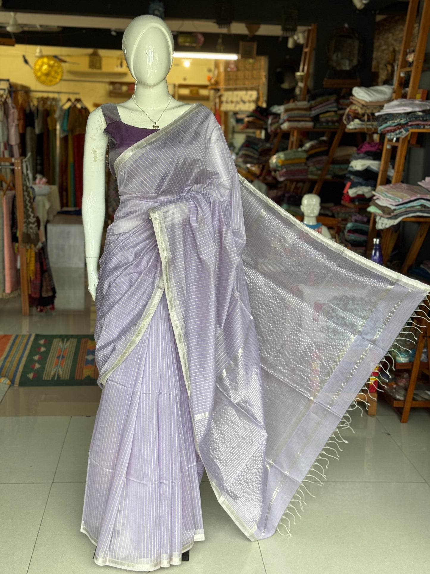 Lavender silk cotton Maheshwari handloom saree with silver zari pallu and vertical stripes all over