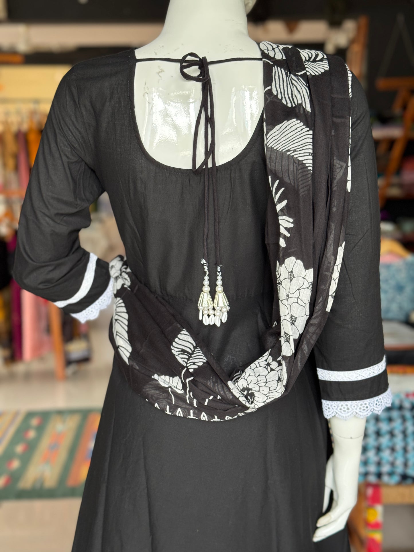 Black floral print dupatta, cotton embroidered flared kurti, straight pants with lace detailing - 3 piece suit set