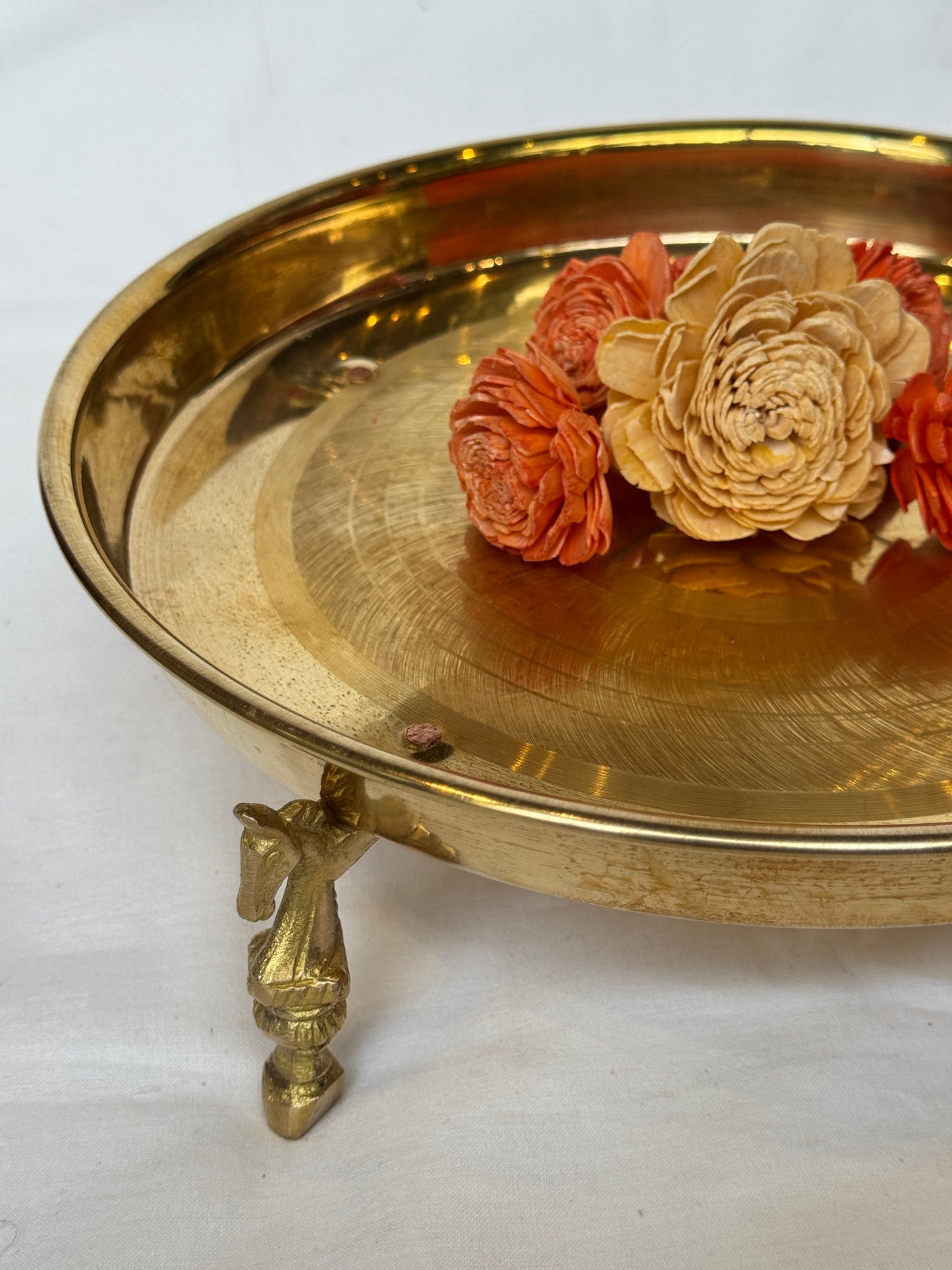 Brass decorative urli / thali / planter stand / riser with horse legs