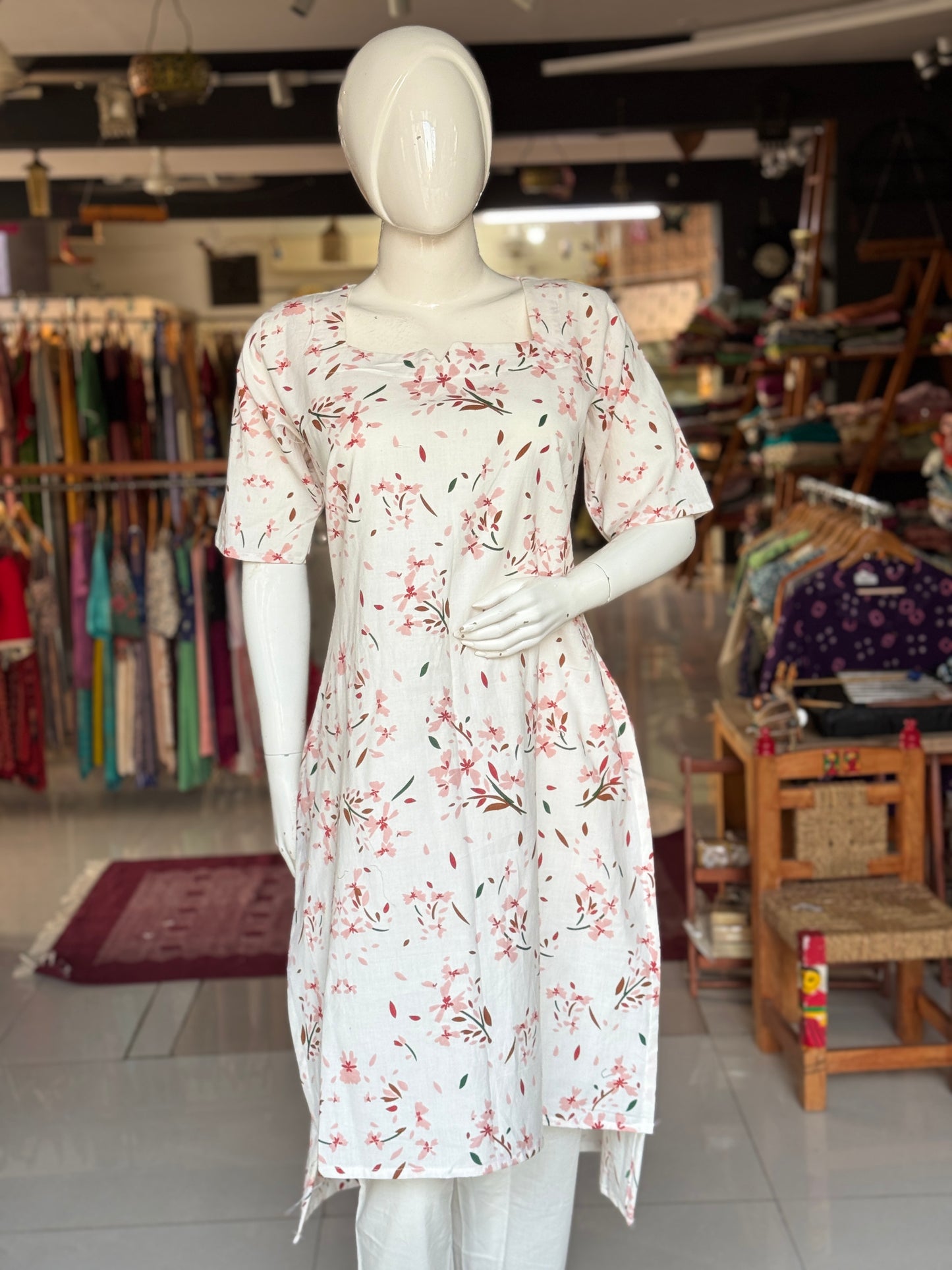 Offwhite handwoven cotton straight cuts kurti with mustard brown and peach flowers print