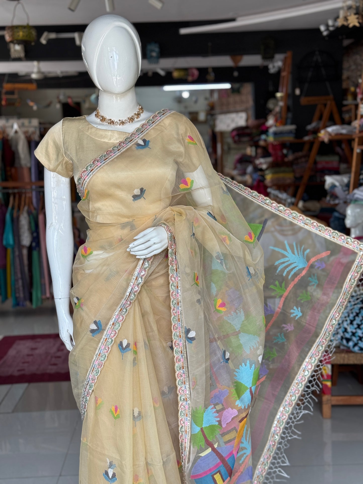 Wheat gold silk organza jamdani saree with hand embroidered beads work scallop lace - beautiful village theme pallu with huts, boats and trees
