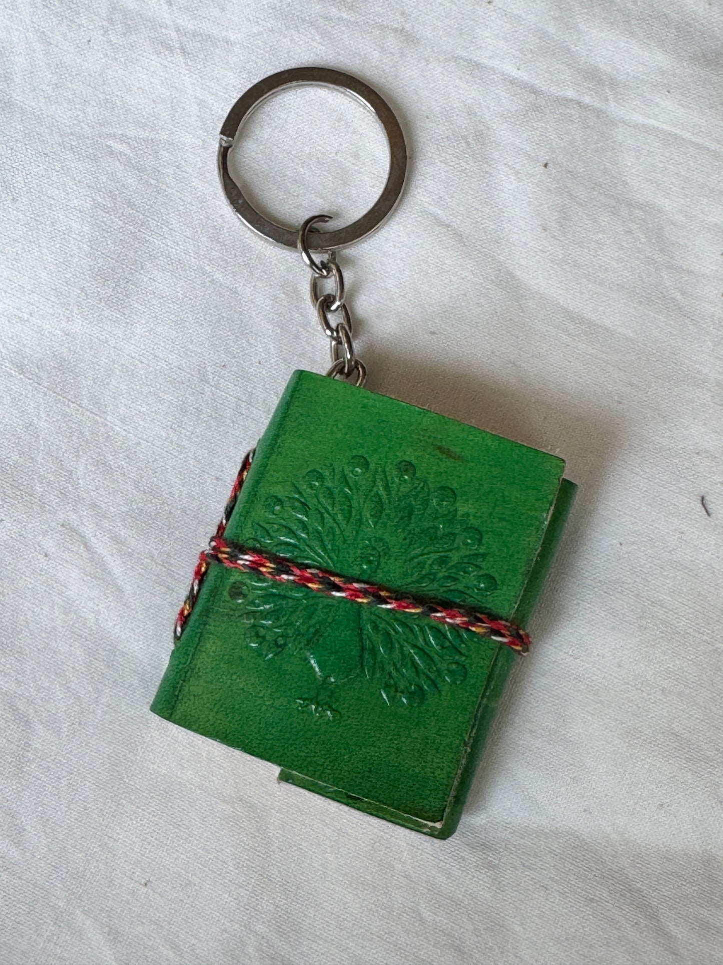 Key ring with Leather embossed handcrafted notebook with thick papers