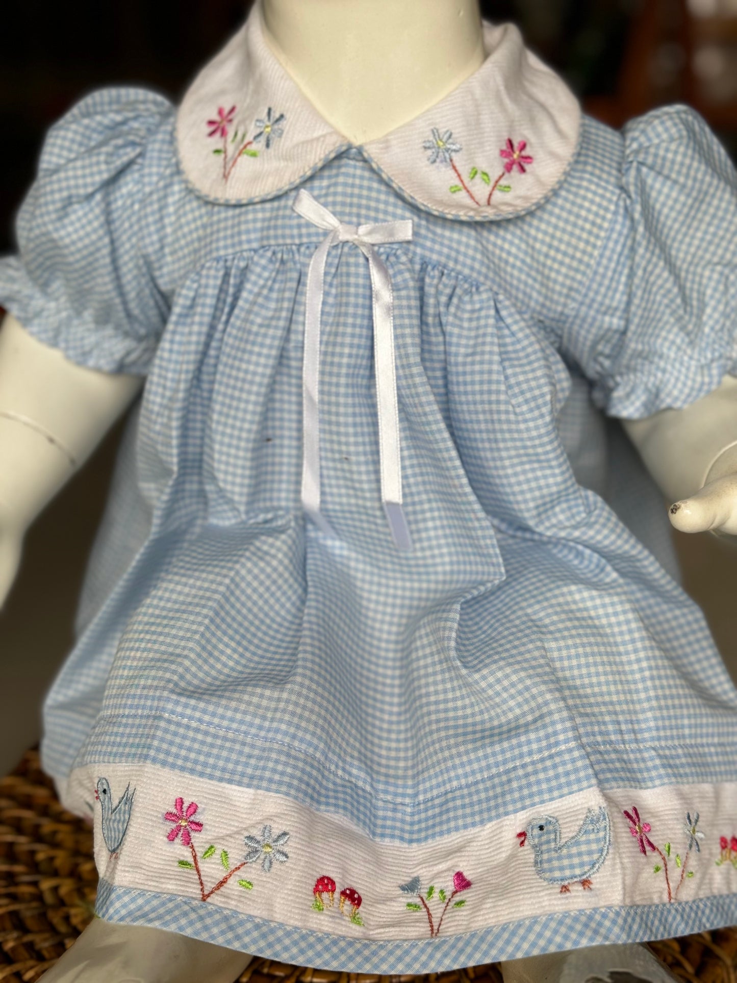 Blue checks cotton frock with cute embroidered hemline and collar