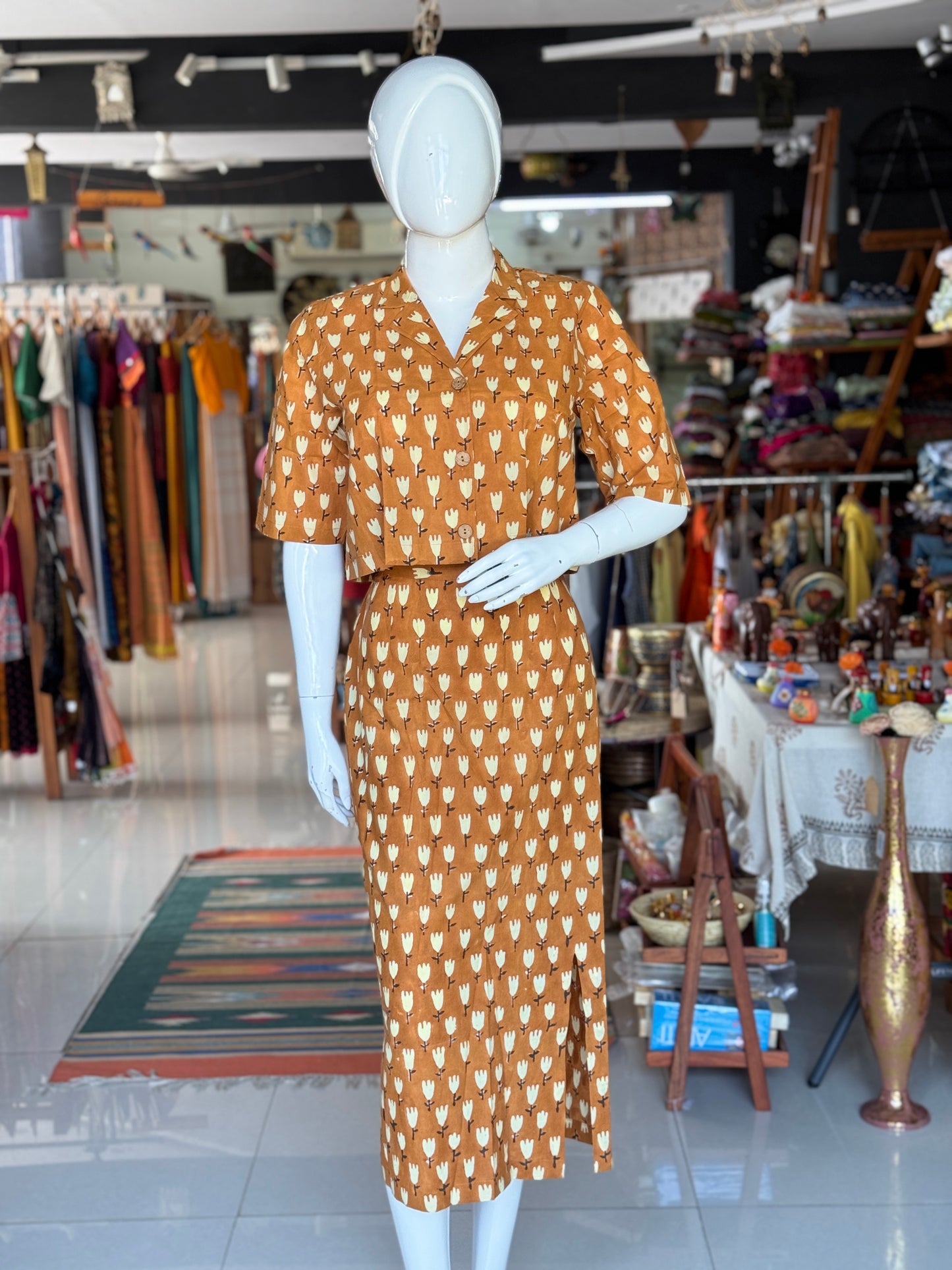 Mustard brown hand block printed cotton coord set with collared crop top and straight skirt with front slit