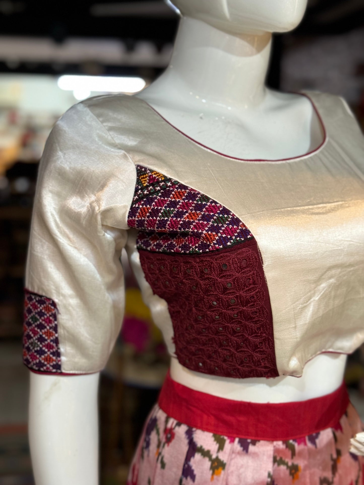 Off white mashru blouse with colorful embroidered on front and sleeves