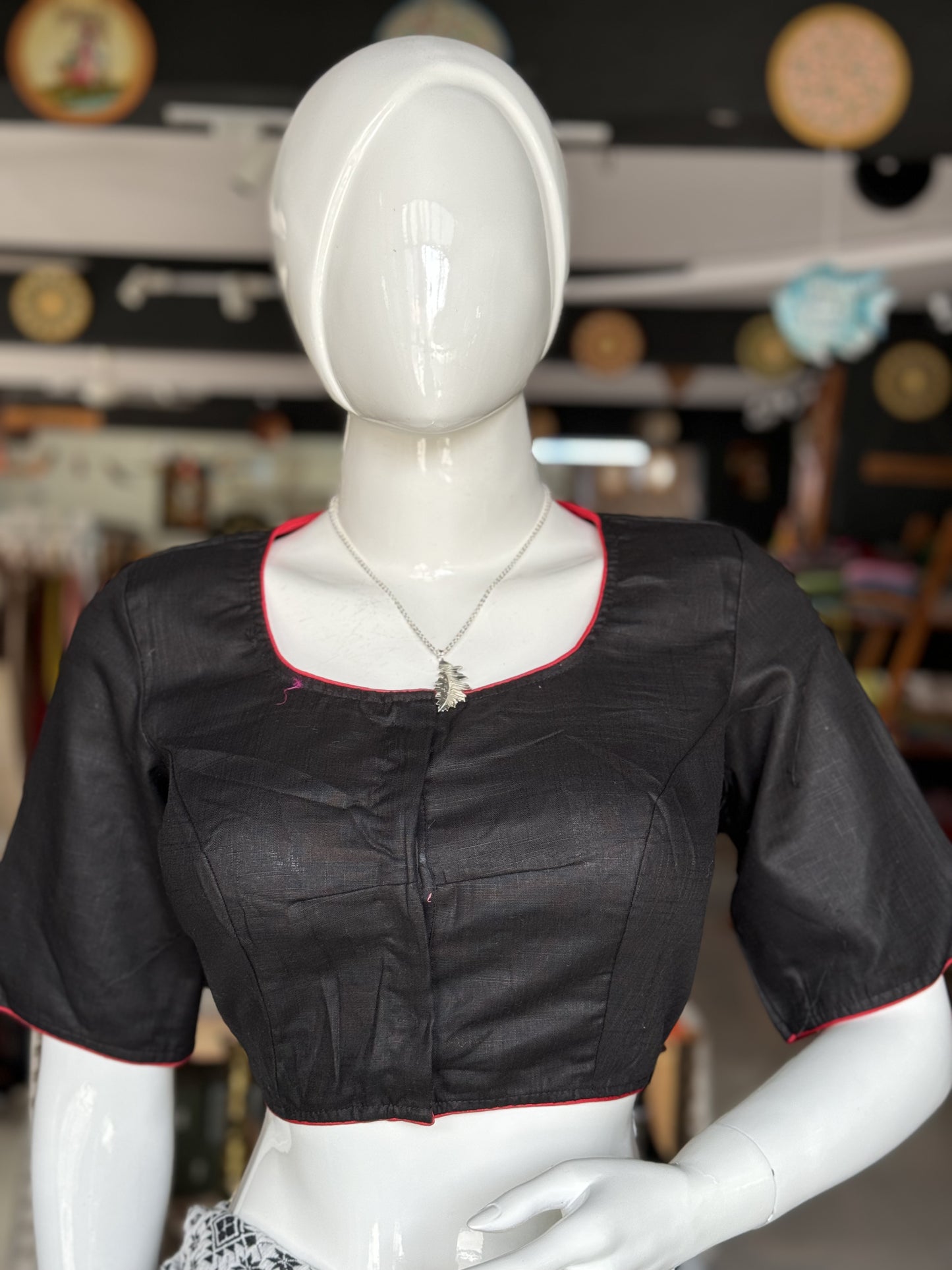 Black cotton blouse with colorful bird and flowers embroidery at the back