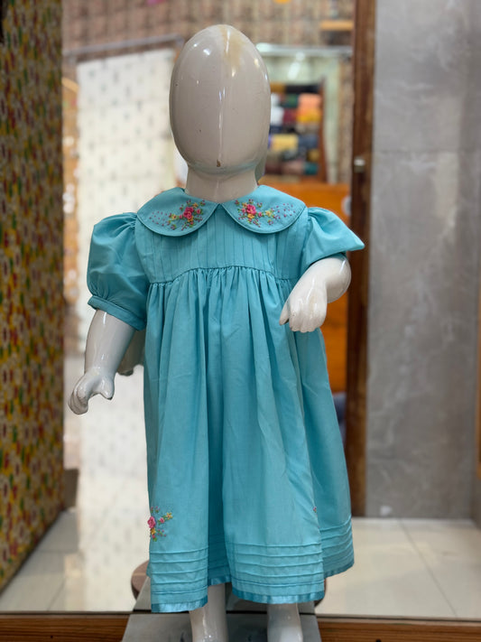 Blue cotton baby frock with flowers hand embroidery, pintucks and trims