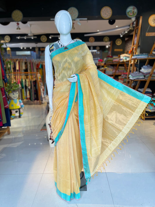 Sandal shade hand spun hand woven cotton saree with sea green and pink borders