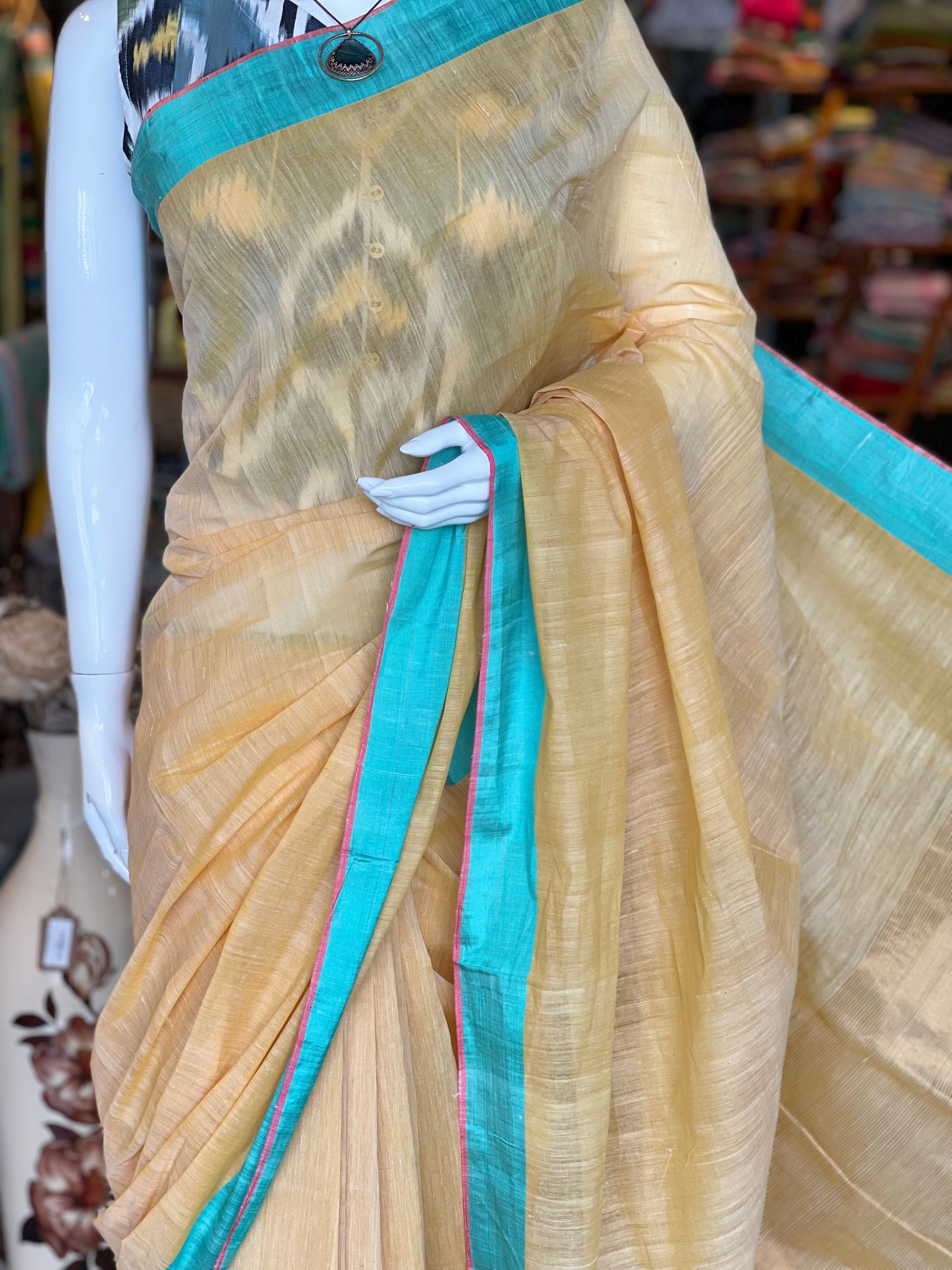 Sandal shade hand spun hand woven cotton saree with sea green and pink borders