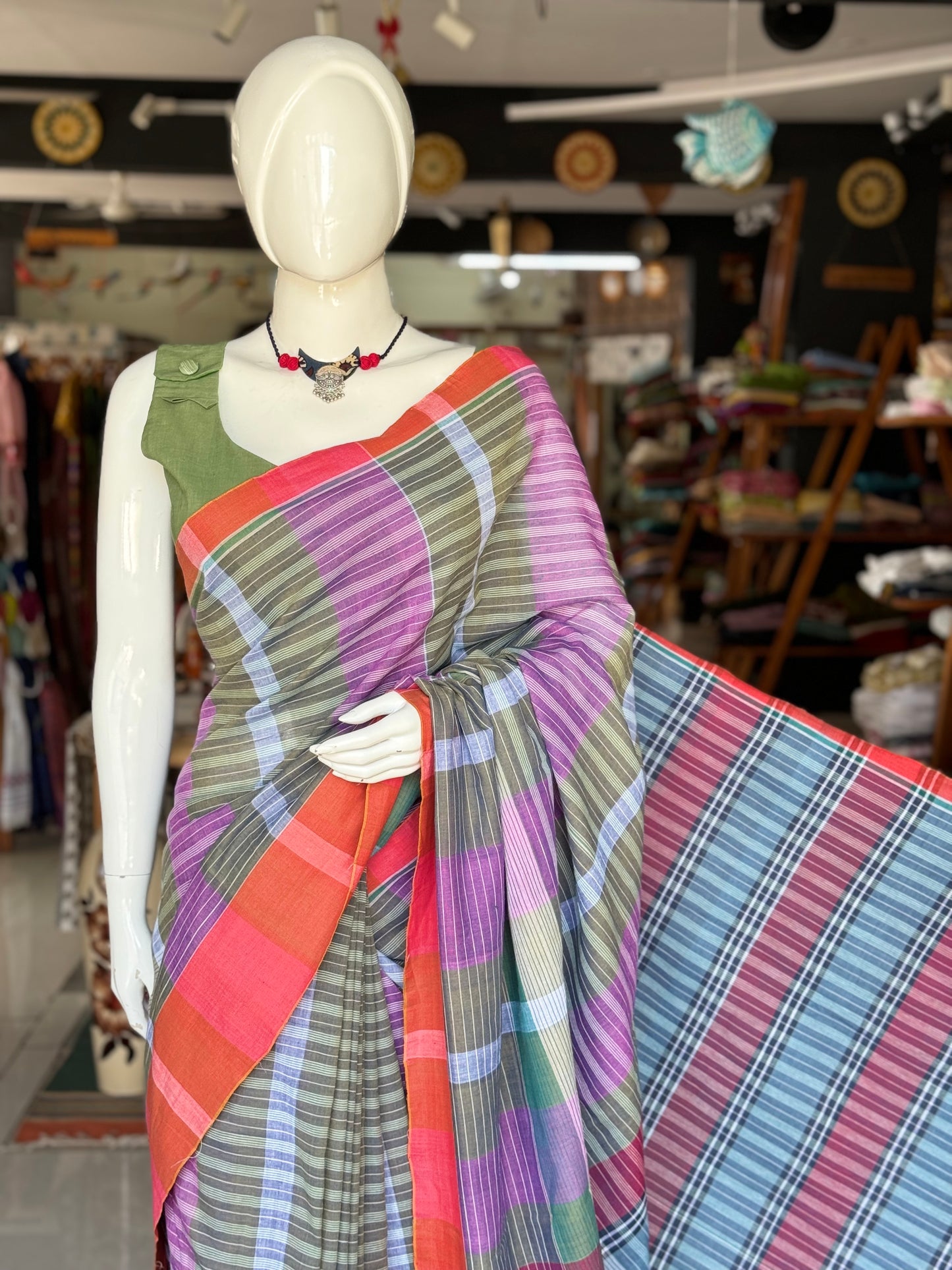 Purple and green gamcha style hand woven cotton saree