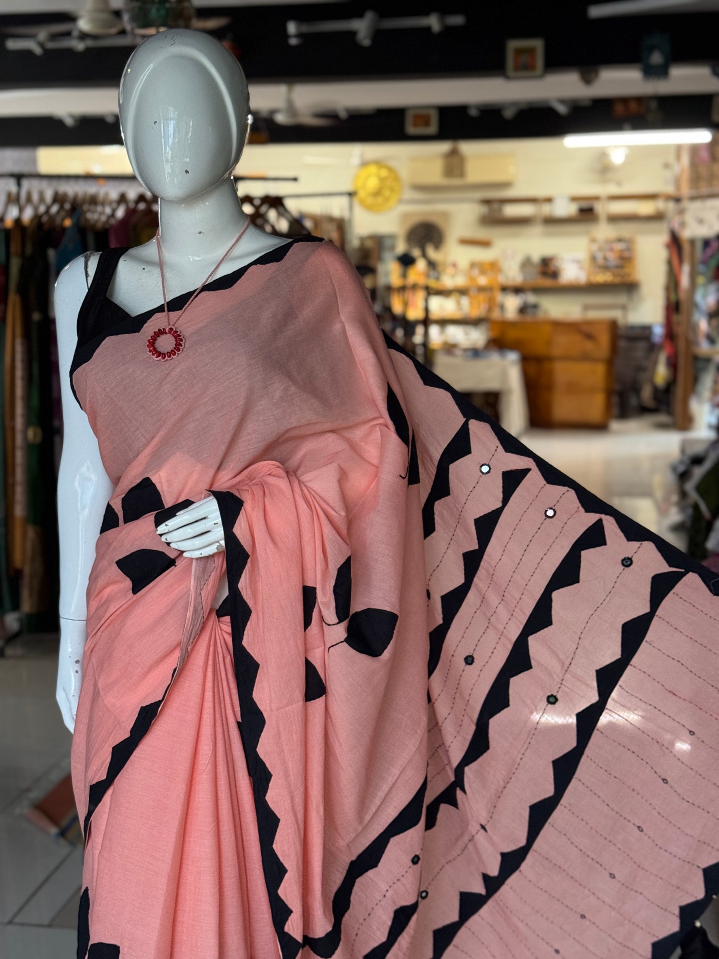 Peach soft cotton saree with black leaves Applique patches and mirror embroidery