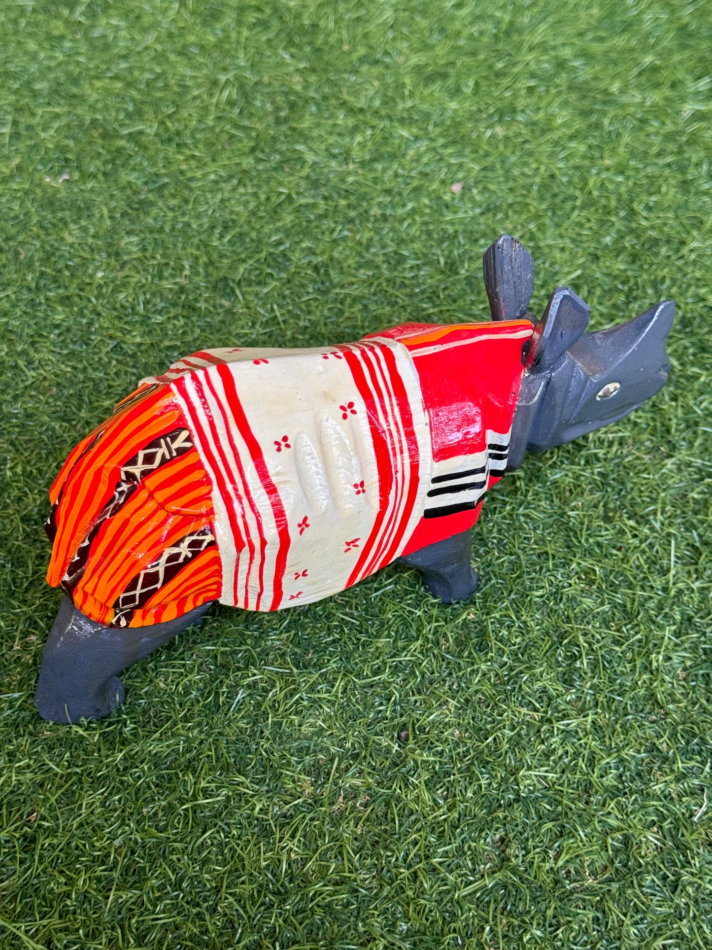 Wooden sculpted and painted rhinoceros from Northeast India
