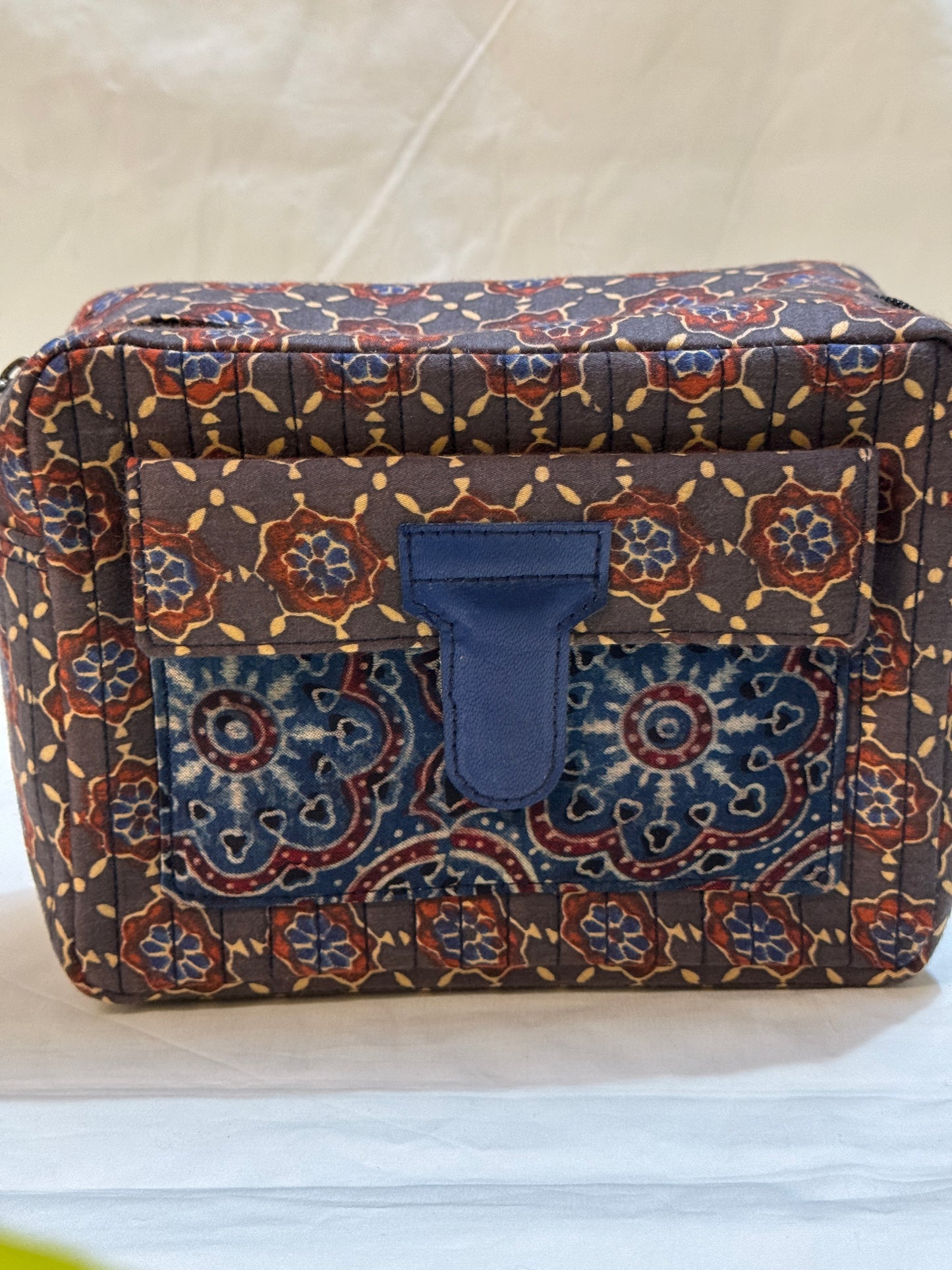 Handcrafted toiletries / travel pouch with leak proof plastic lining plus colorful front pocket with leather patch