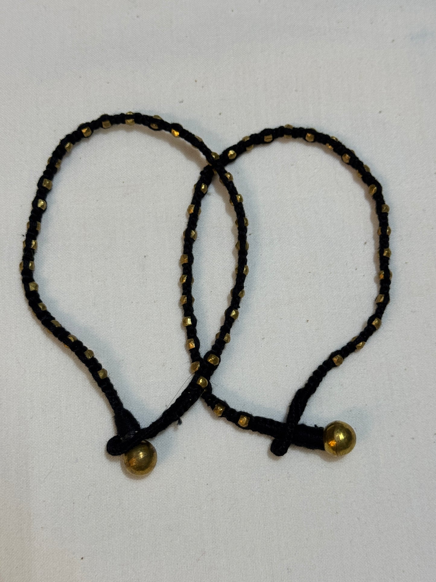 Nazariya anklets pair - handcrafted Dokra brass beads with black thread - multiple designs available