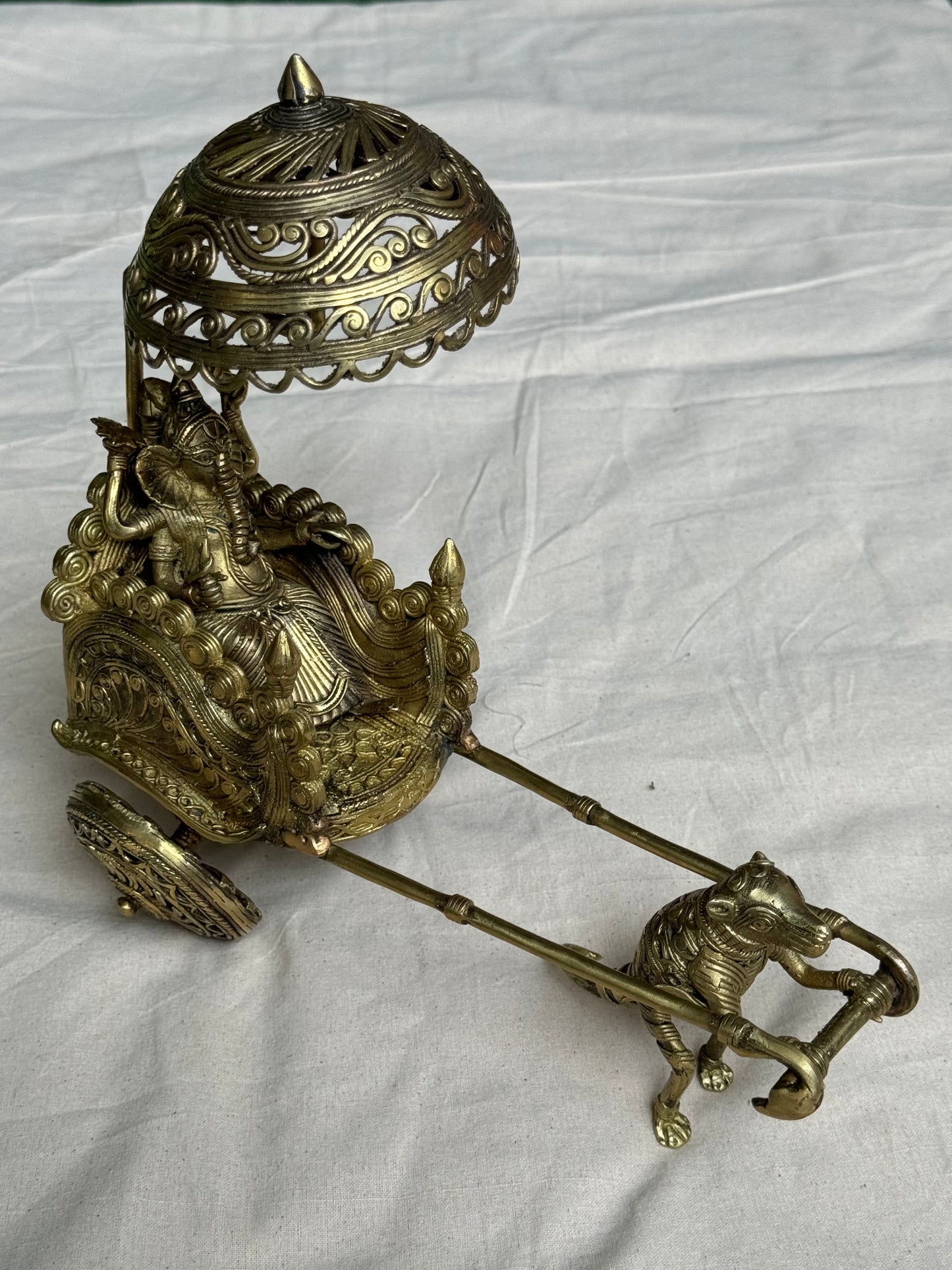Ganesha on a rath/ chariot pulled by mooshika - brass dokra hand crafted decor